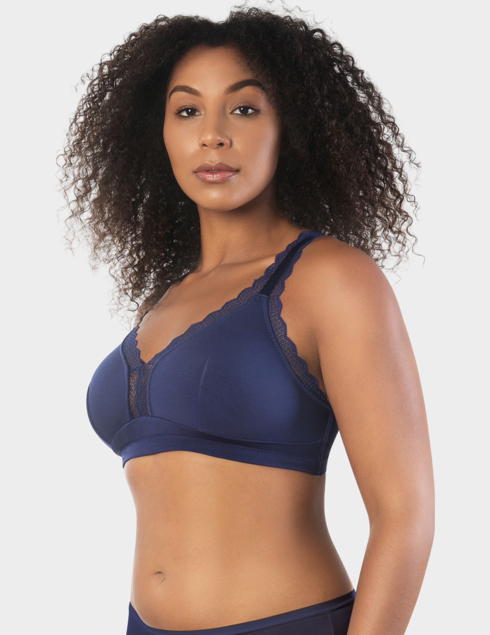 Side view of a model wearing Parfait Dalis bralette in Navy