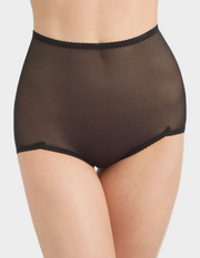 Front view of a model wearing Rago 40 sheer black shaping panty