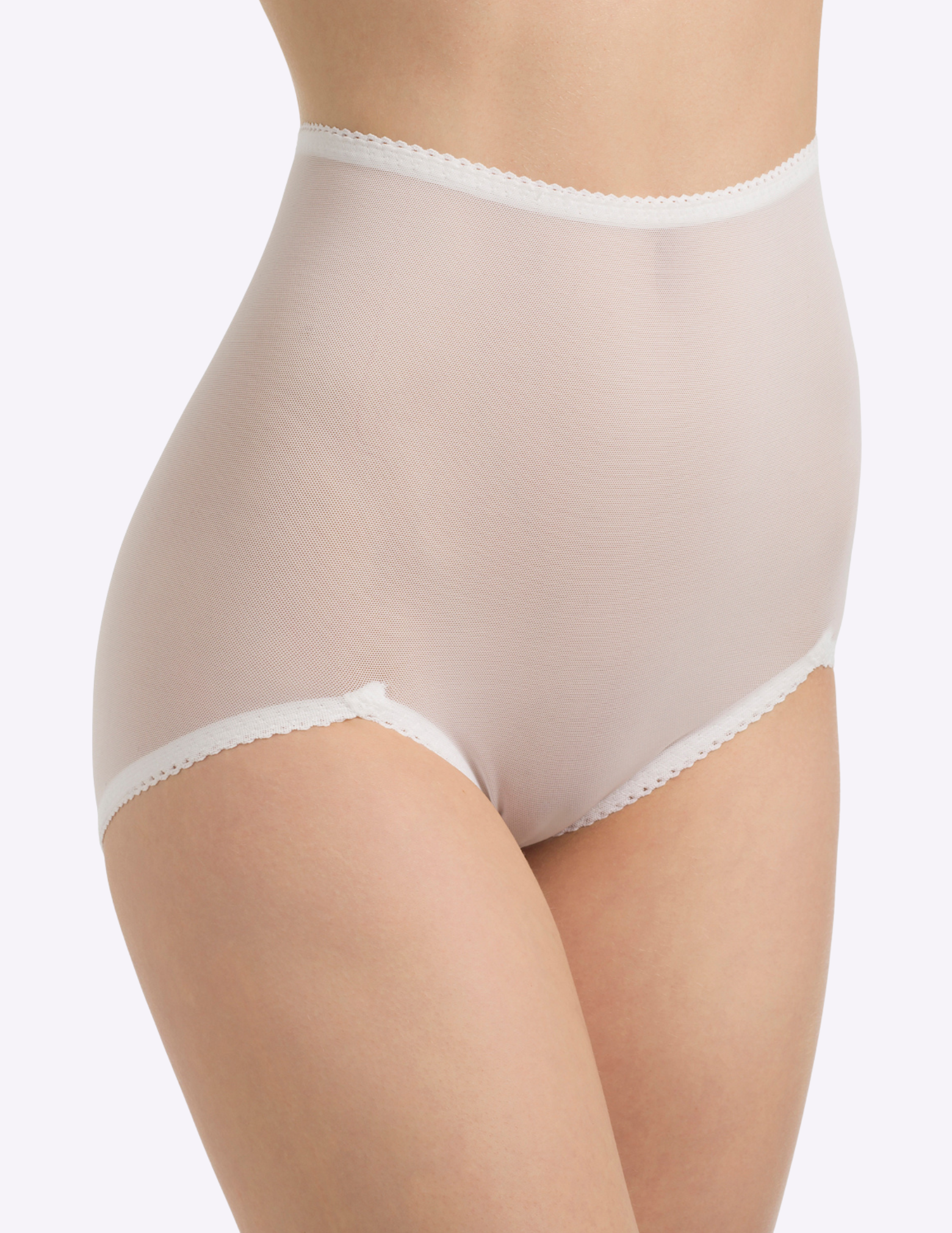 Front view of a model wearing Rago 40 sheer white shaping panty