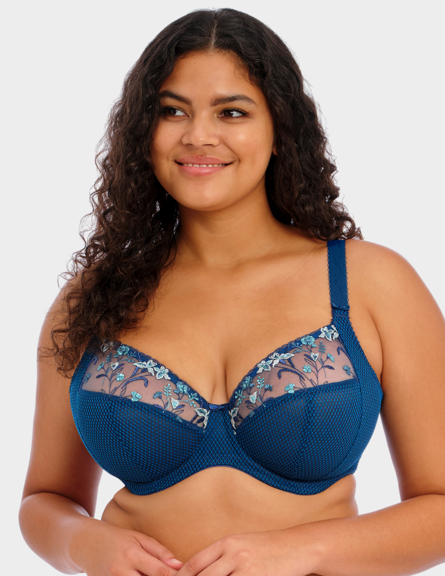 Front view of a model wearing Elomi Charley plunge bra in petrol