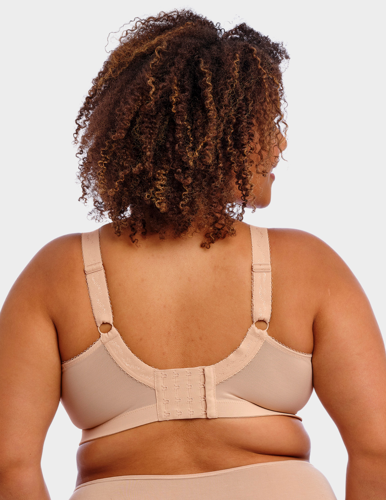 Back view of a model wearing Goddess Keira wirefree nursing bra in fawn