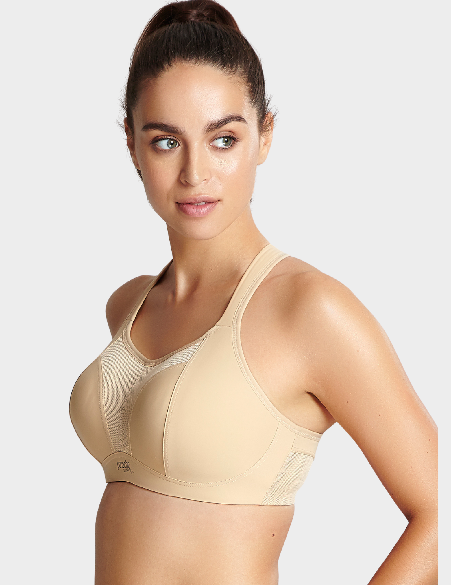 Side view of a model wearing Panache Non wired sports bra in Latte