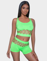 Front view of a model wearing a neon green crop top and shorts set with cutout details