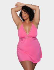 Front view of a model wearing a pink babydoll dress