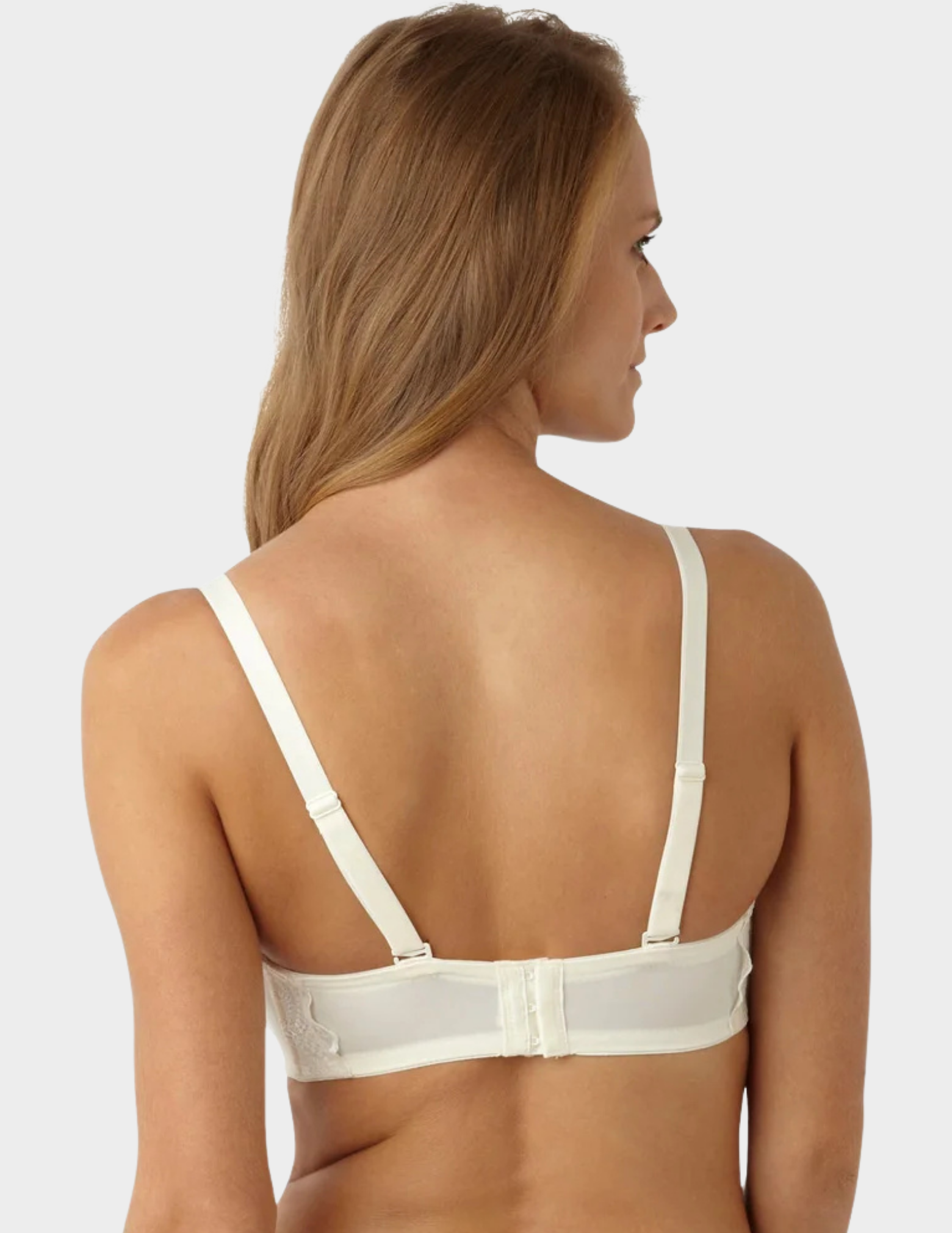 Back view of a model wearing Panache Evie Bridal strapless bra in Ivory with straps attached