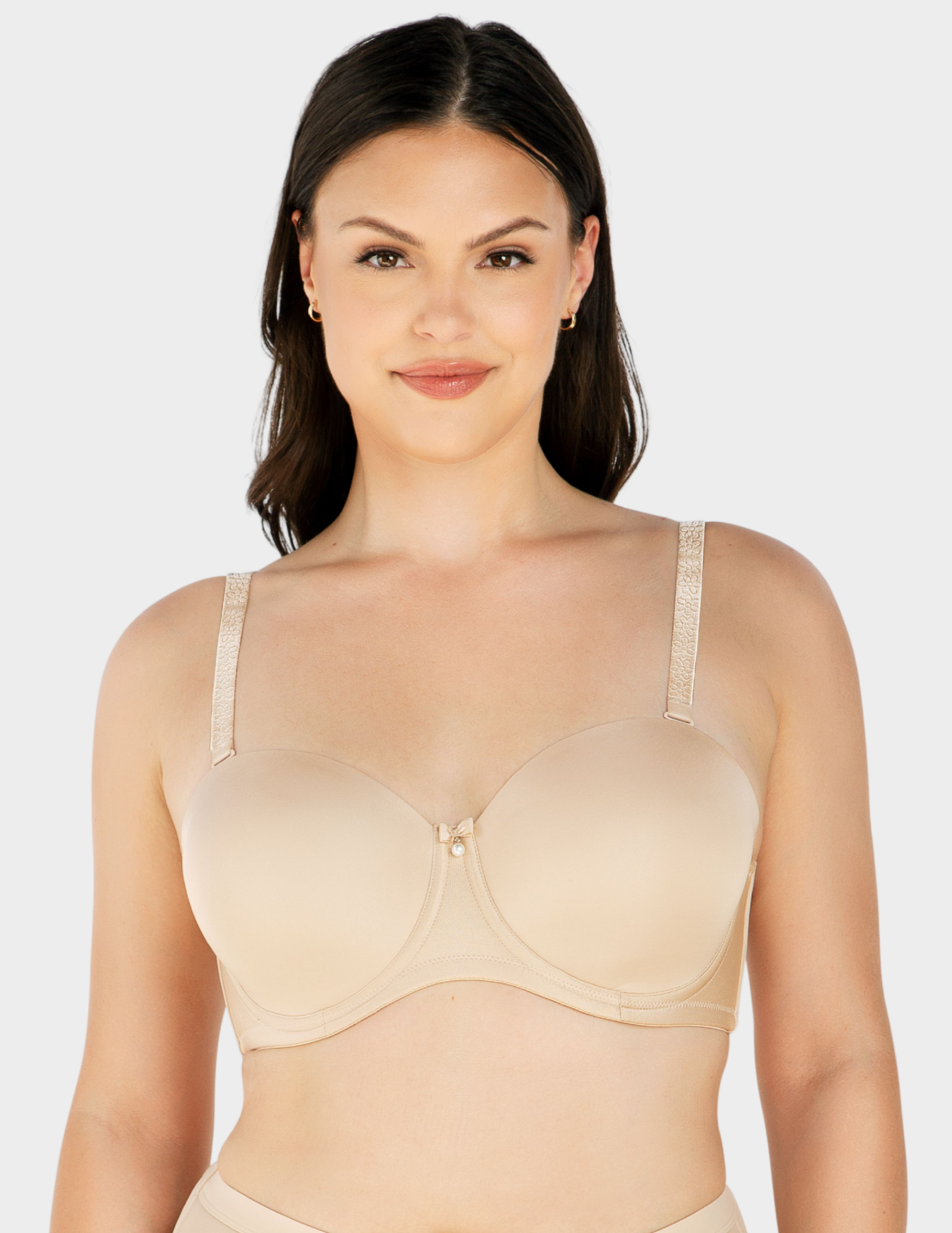Front view of a model wearing Parfait Elise strapless bra in Bare with straps attached