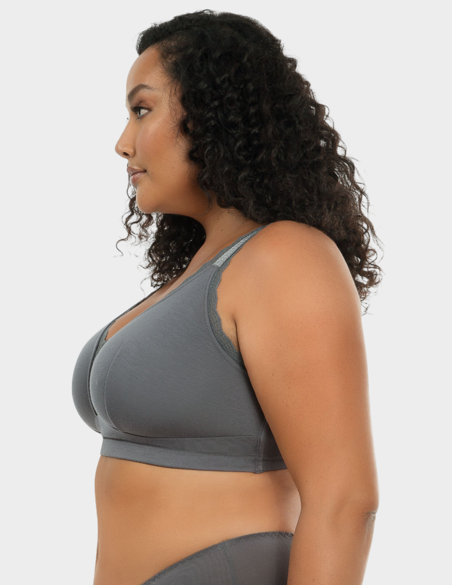 Side view of a model wearing Parfait Dalis bralette in Charcoal