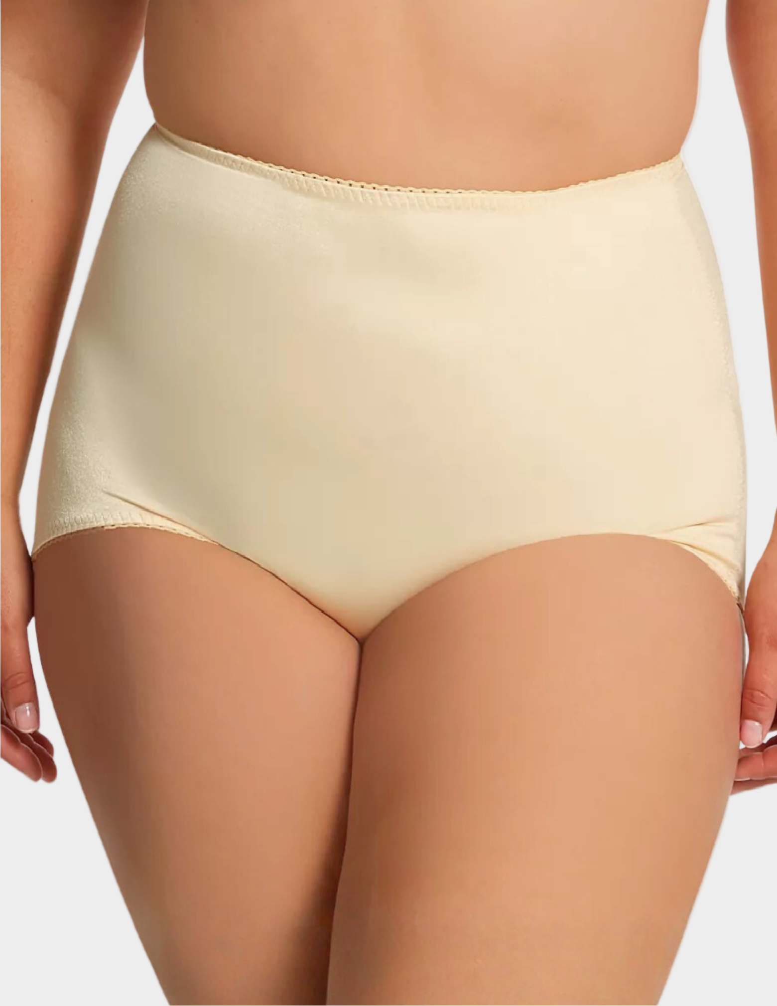 Front view of a curvy model wearing Rago 511 beige shaping panty