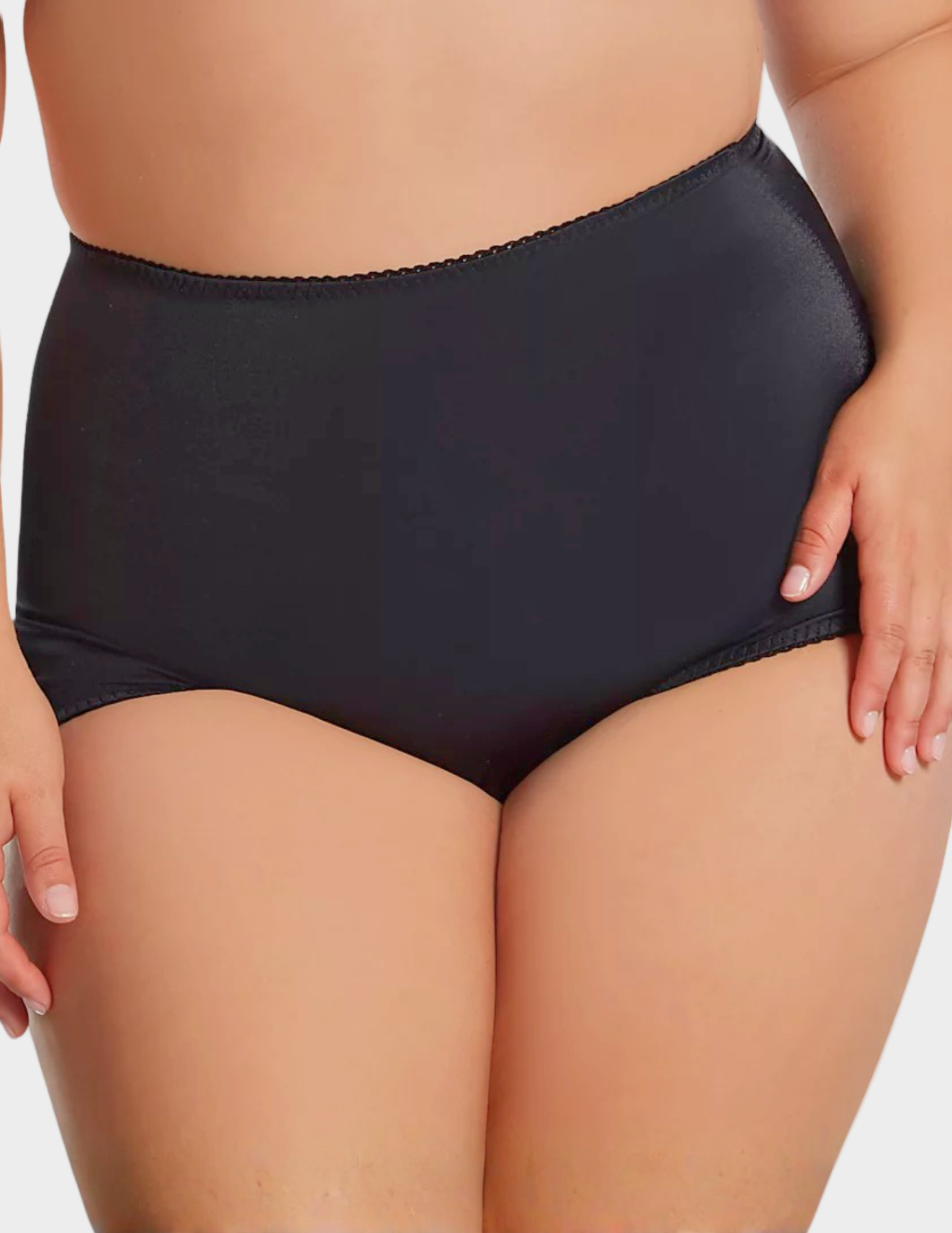 Front view of a curvy model wearing Rago 511 black shaping panty