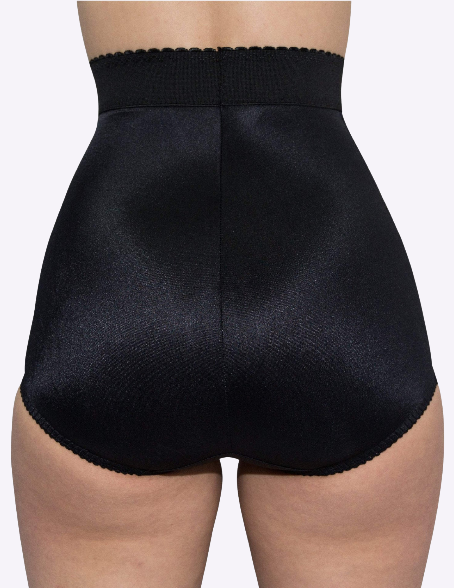 back view of model wearing black Rago 513 shaping panty
