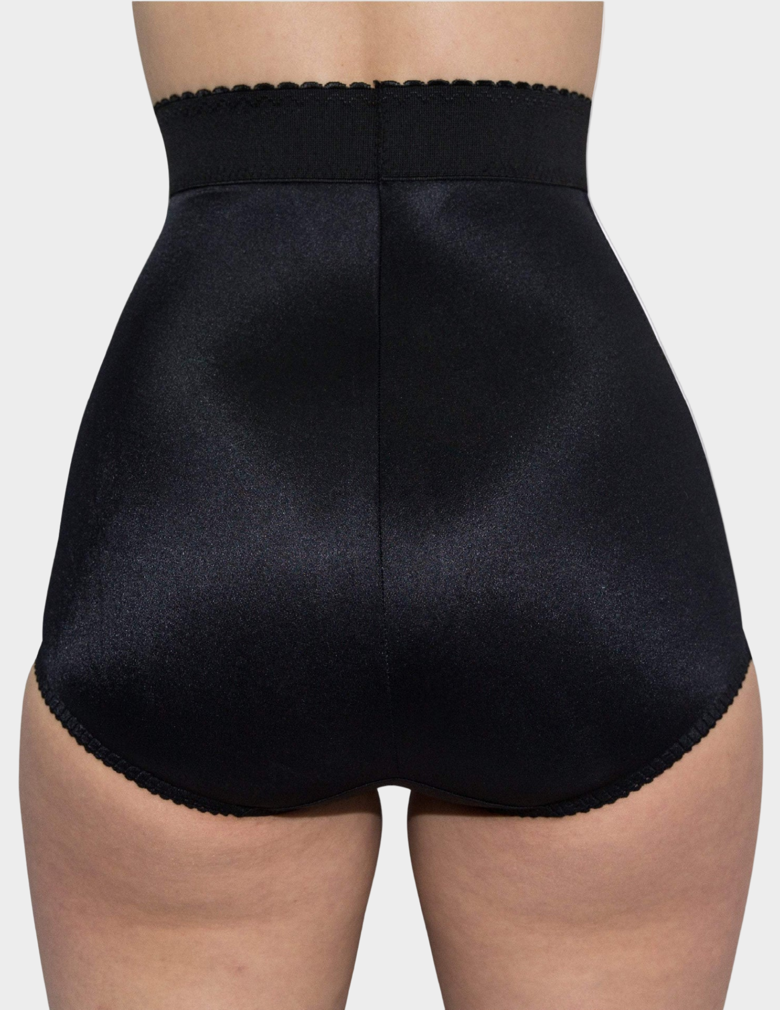 back view of model wearing black Rago 513 shaping panty