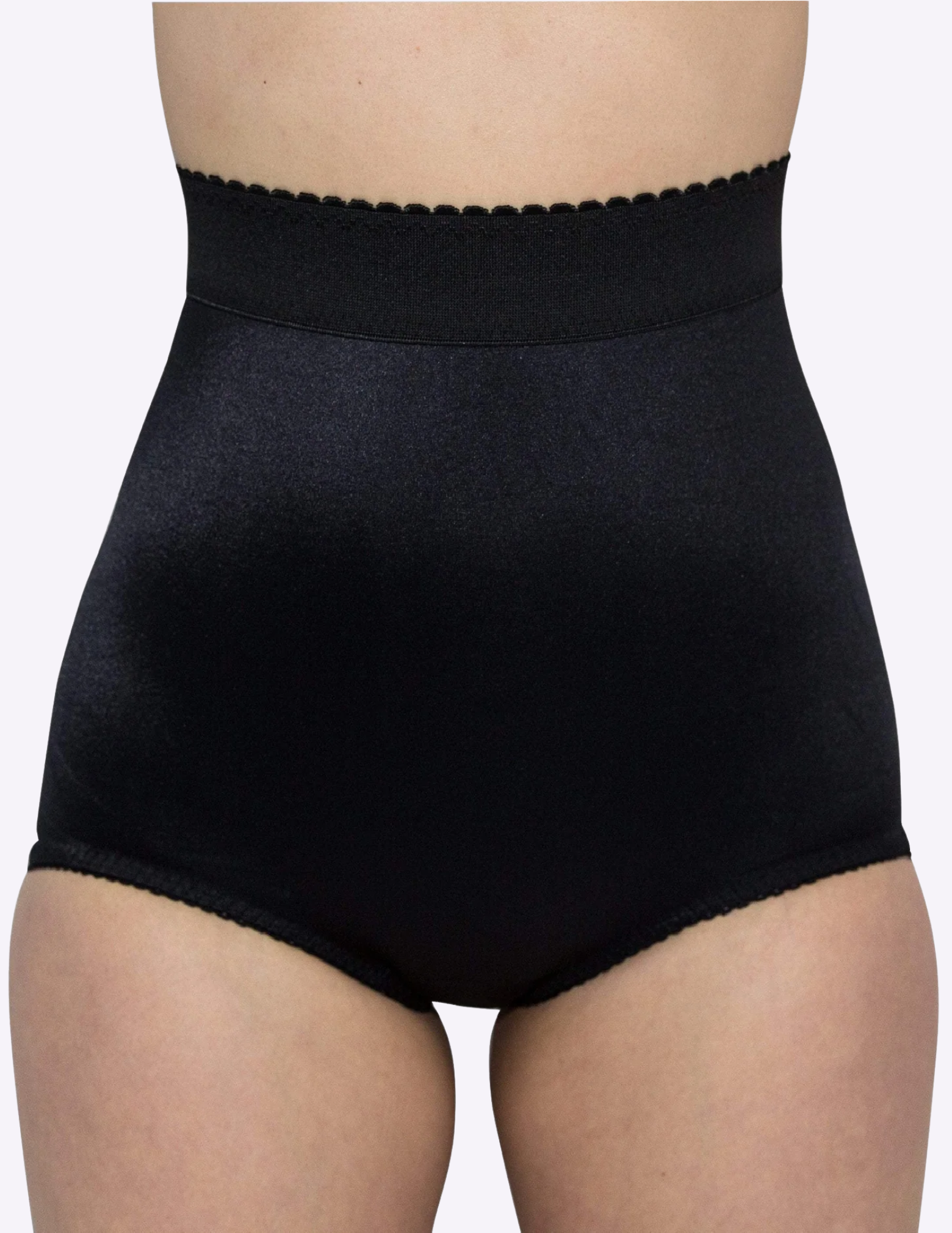 front view of model wearing black Rago 513 shaping panty