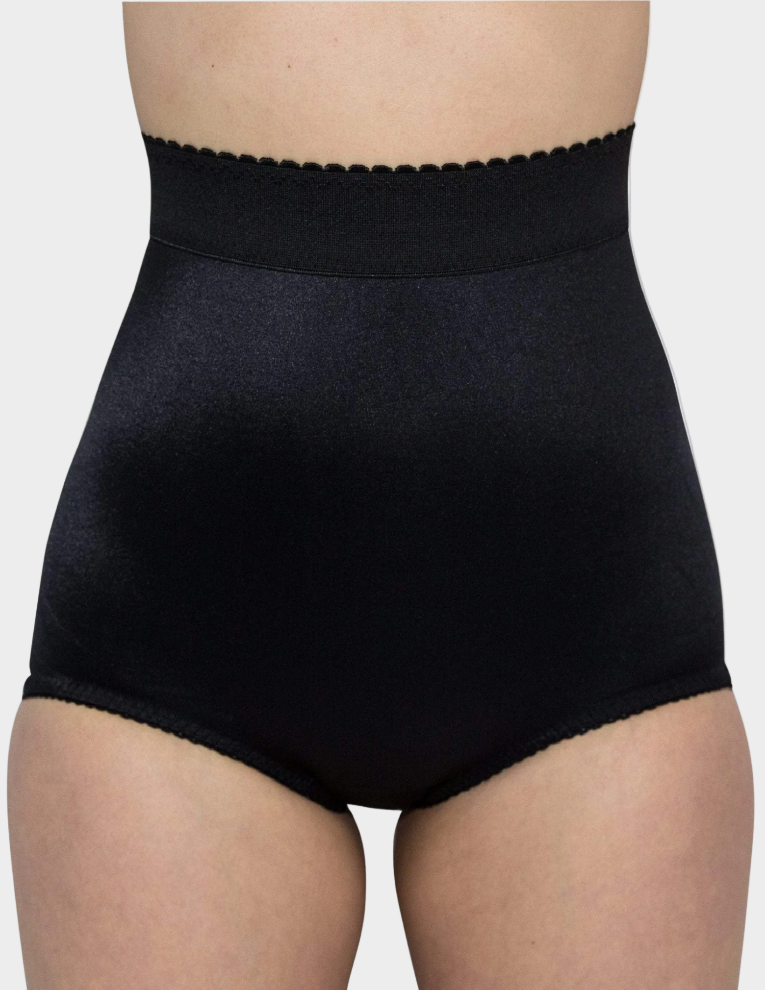 front view of model wearing black Rago 513 shaping panty