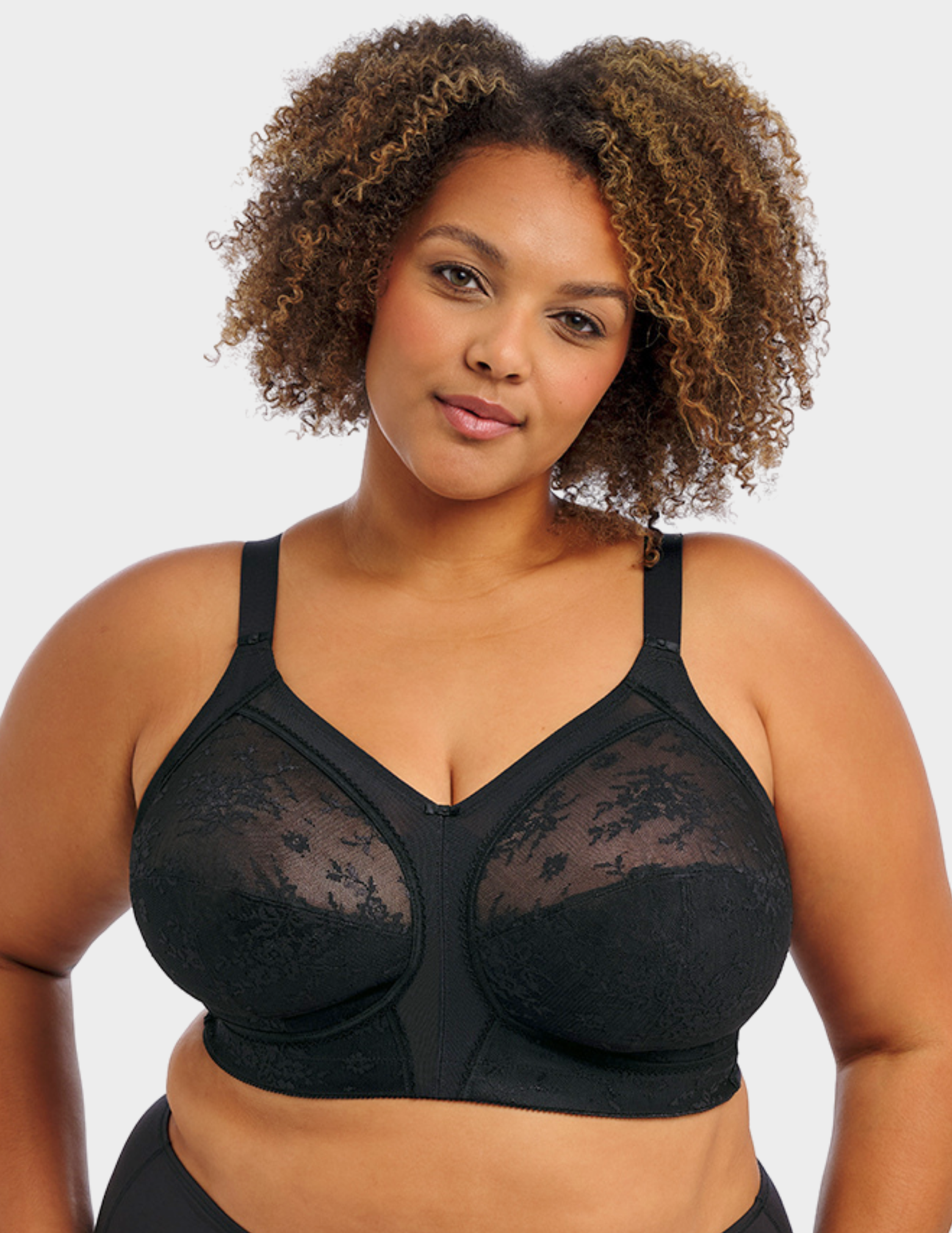 Front view of a model wearing Goddess Verity wireless bra in Black