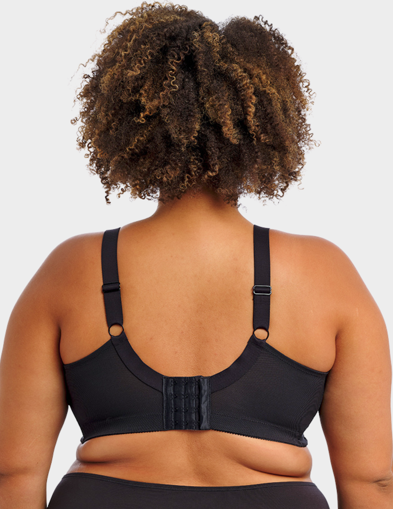 Back view of a model wearing Goddess Verity wireless bra in Black