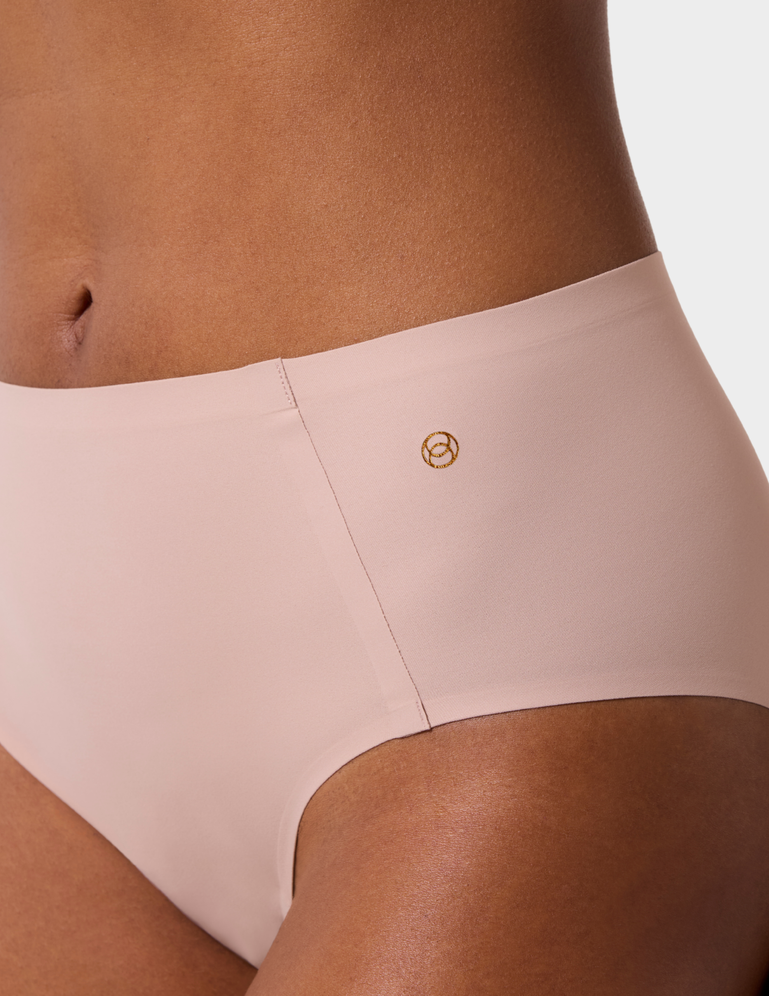 Close up view of a model wearing Evelyn & Bobbie high waist brief in Petal Drift