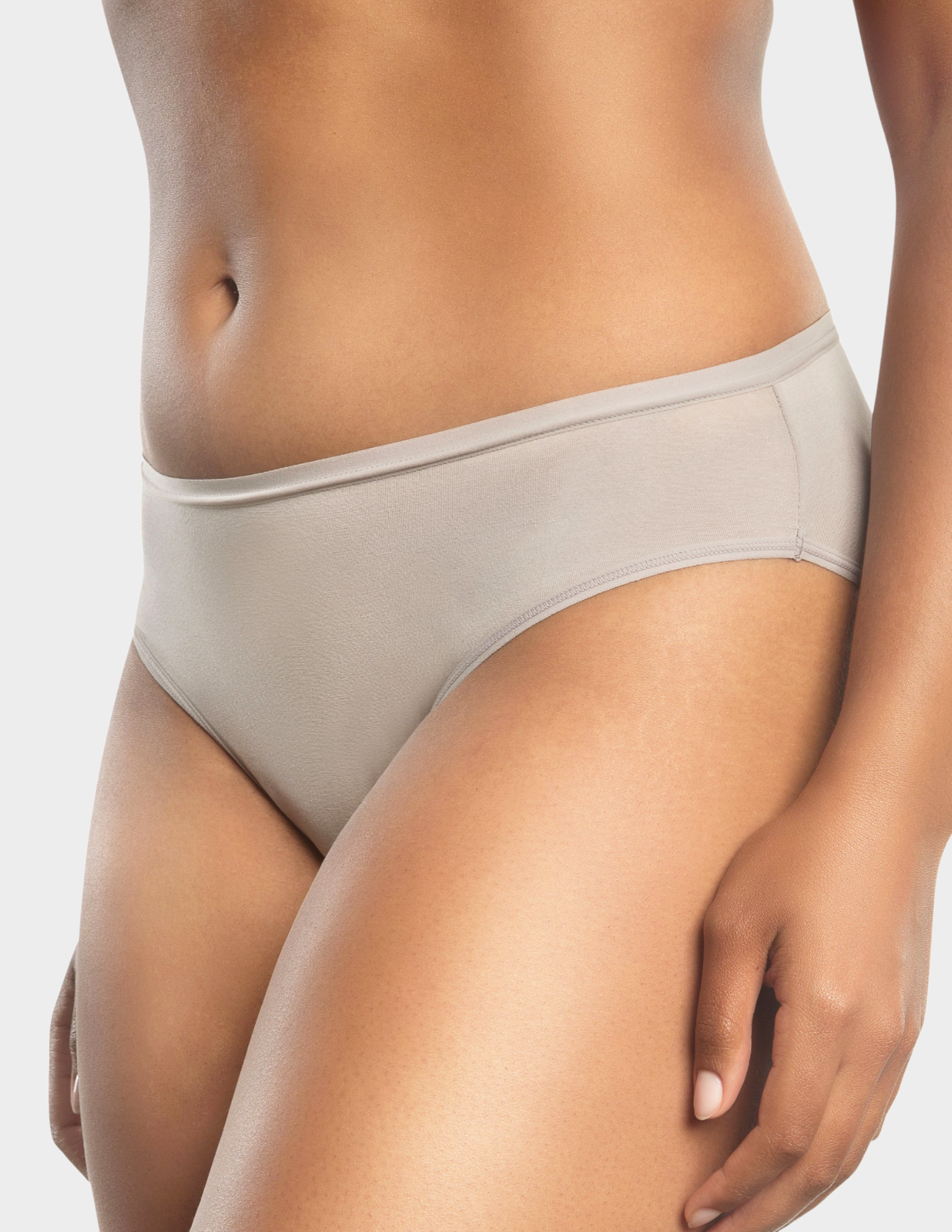 Side view of a model wearing Parfait Cozy hipster panty in Sandstone