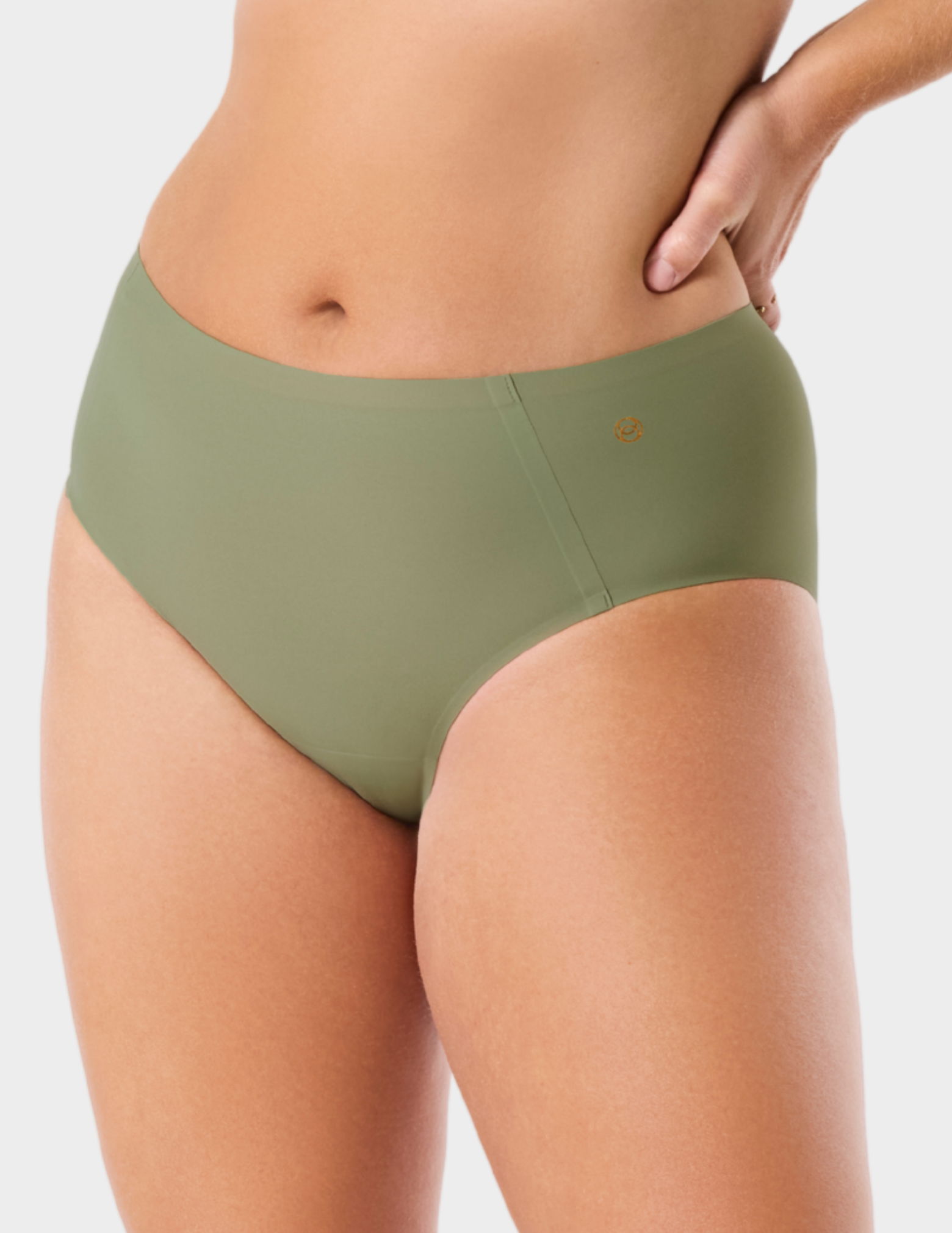 Front view of a model wearing Evelyn & Bobbie high waist brief in Matcha