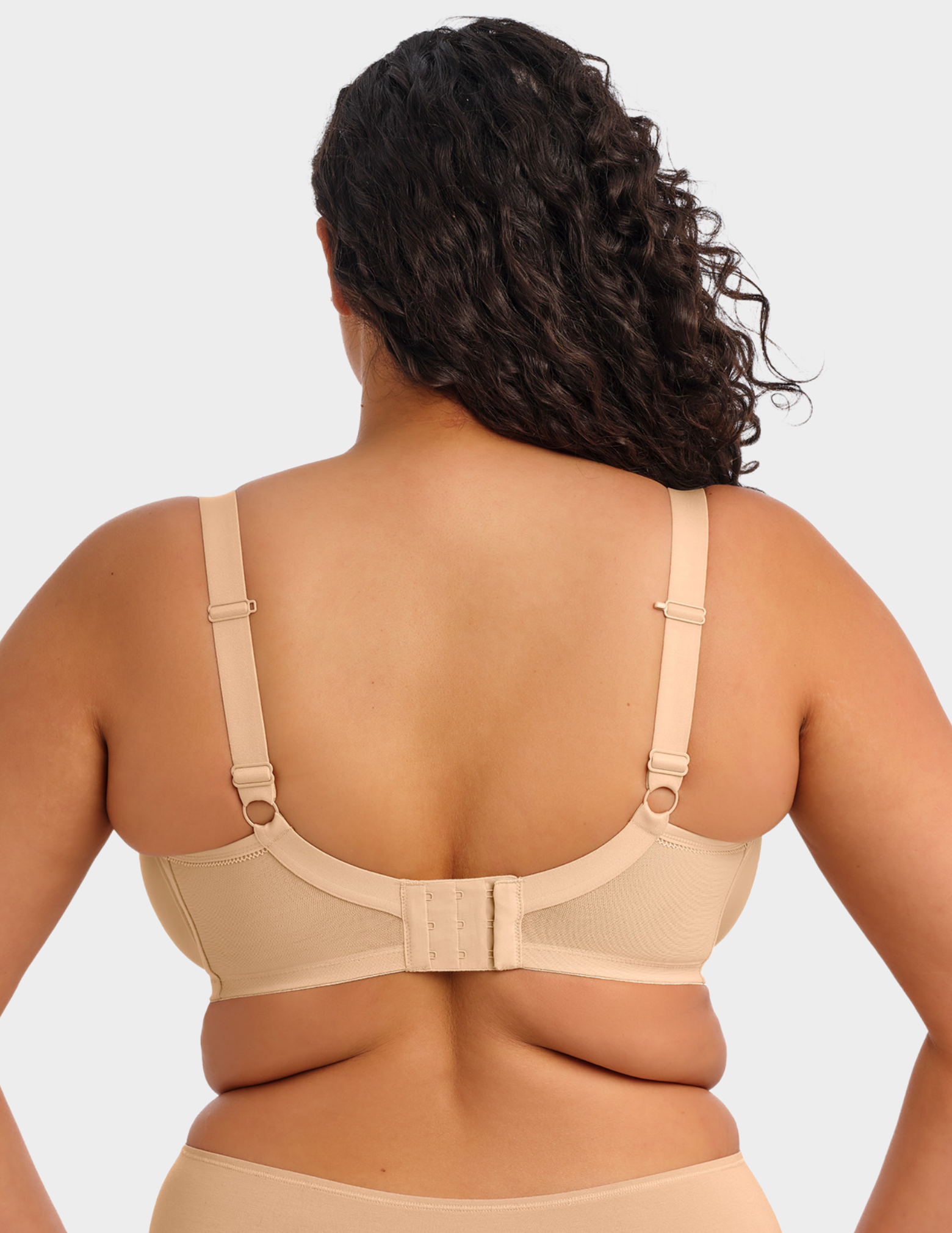 Back view of a model wearing Elomi Bijou plunge bra in sand