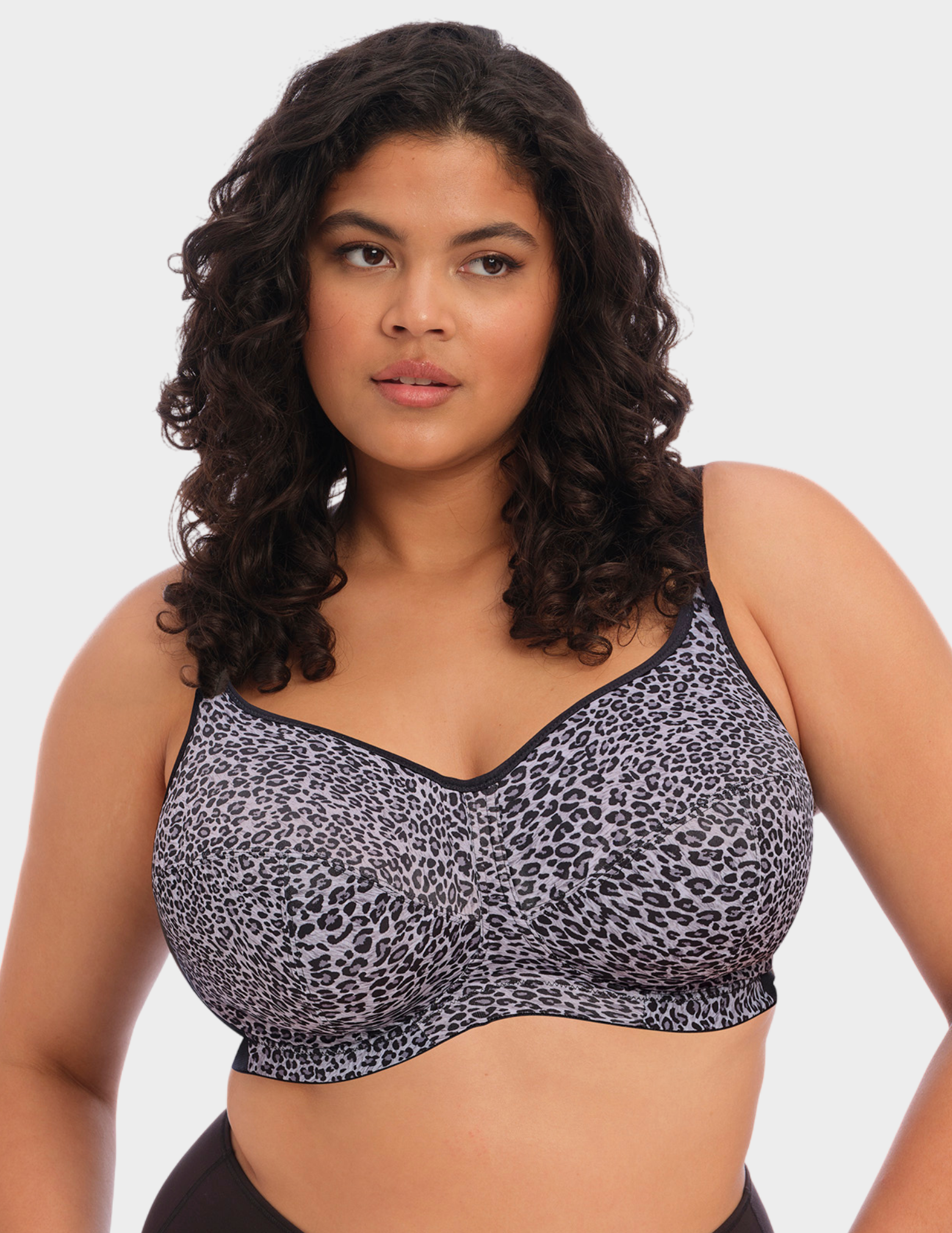 Front view of a model wearing Goddess Celeste bralette in grey leopard
