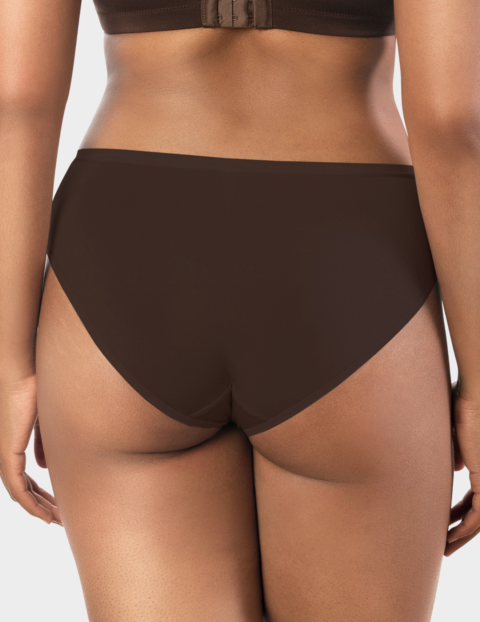 Back view of a model wearing Parfait Cozy hipster panty in Deep Nude