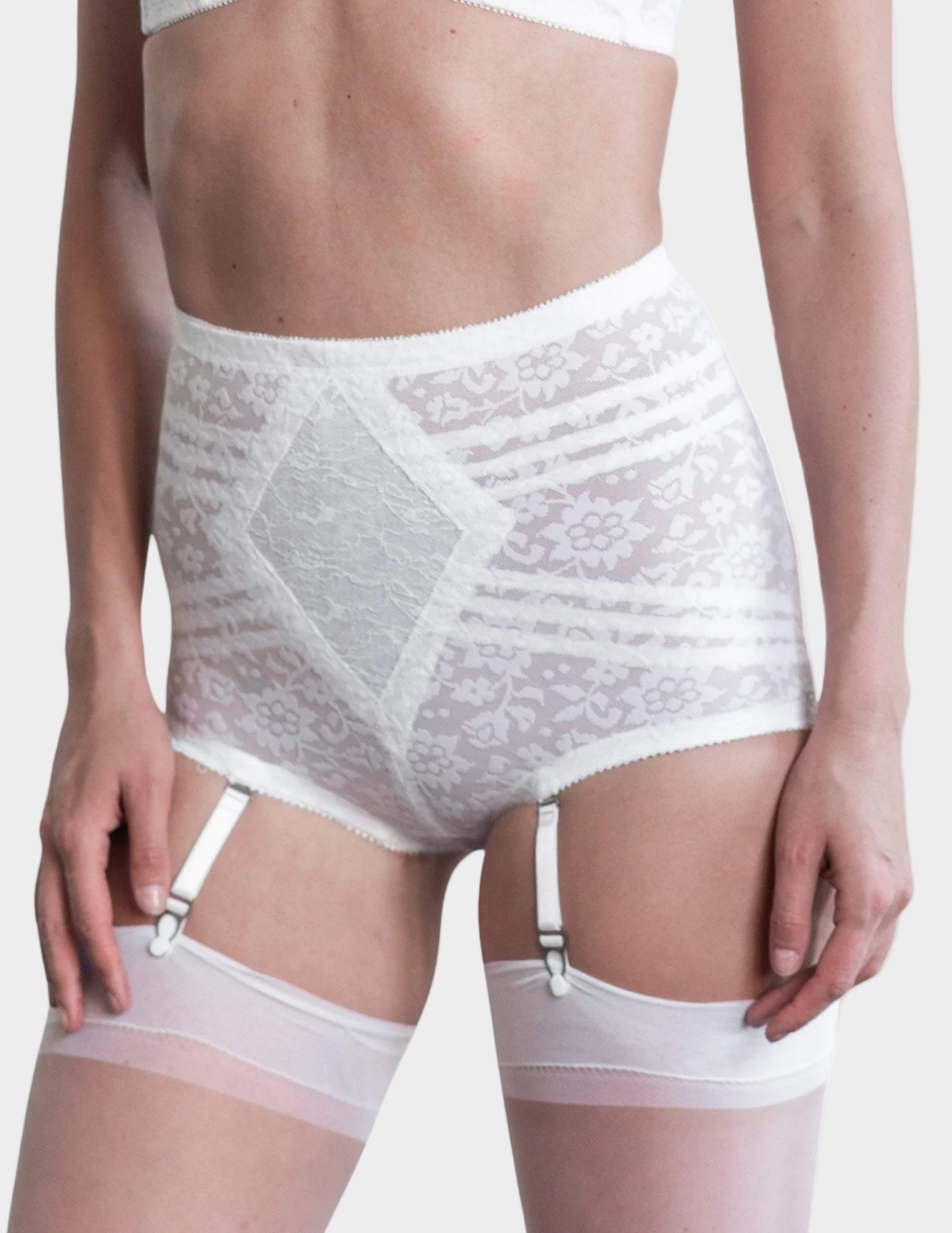 Front view of a model wearing white Rago 6197 shaping panty