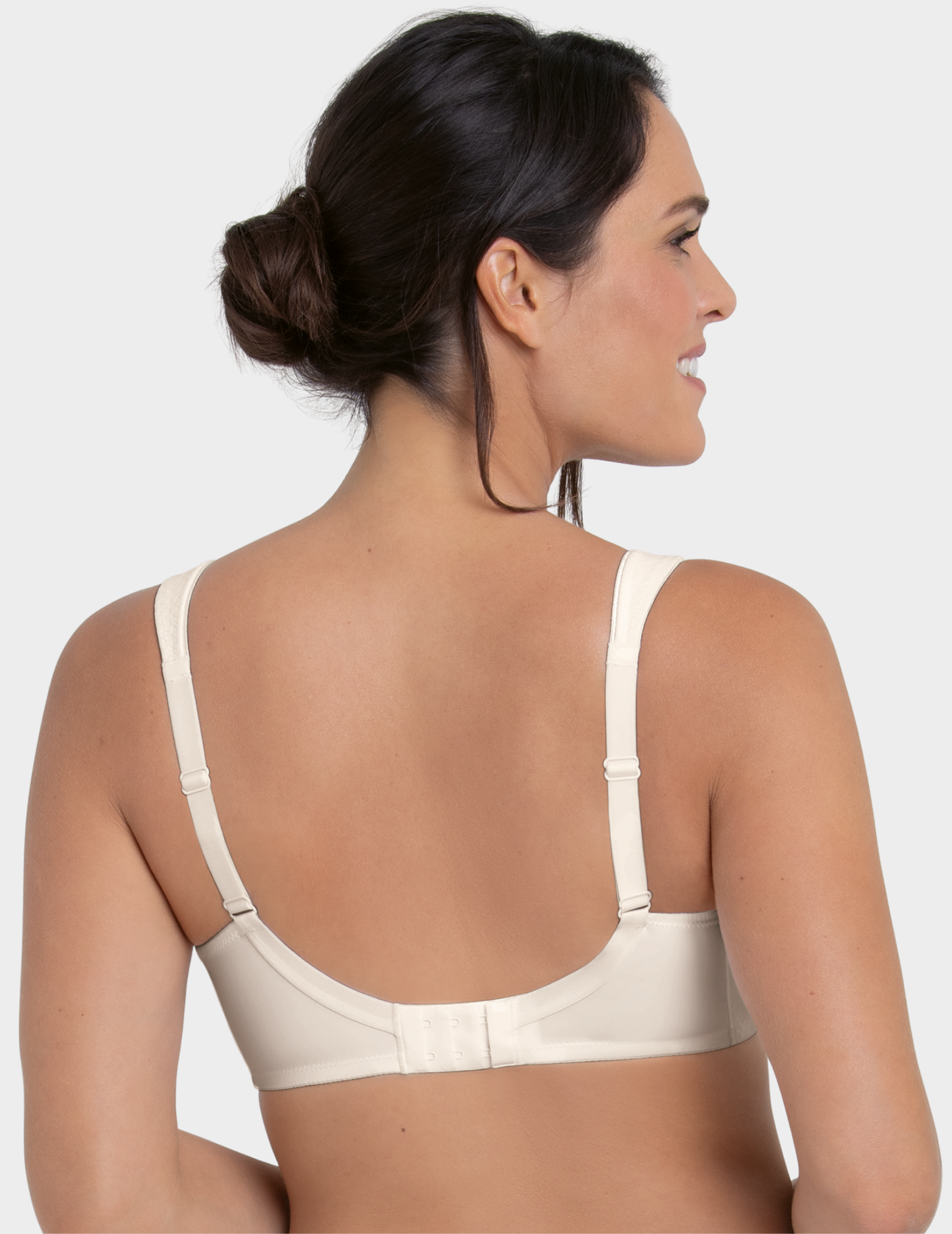 Back view of a model wearing Anita Leni post mastectomy bra in color Crystal