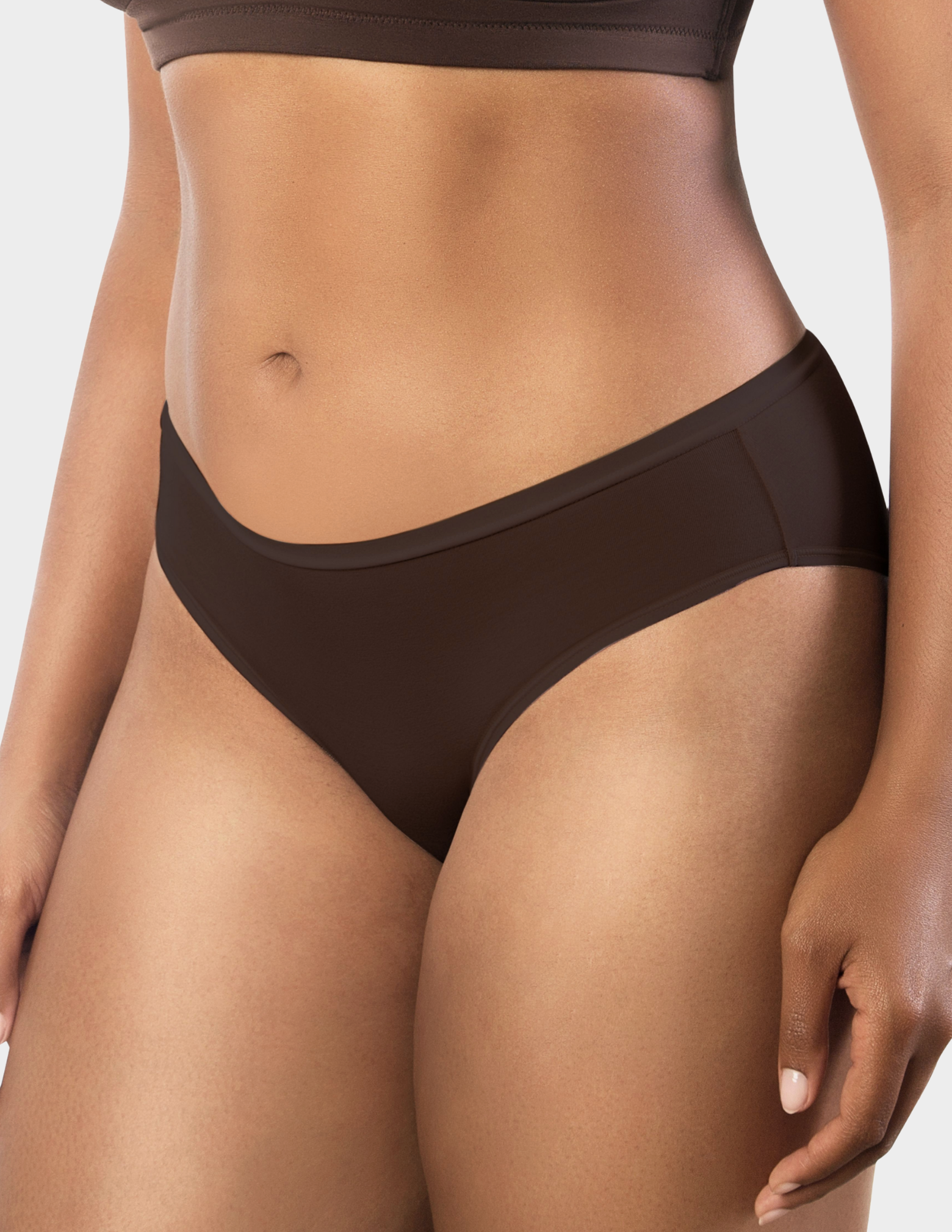 Side view of a model wearing Parfait Cozy hipster panty in Deep Nude