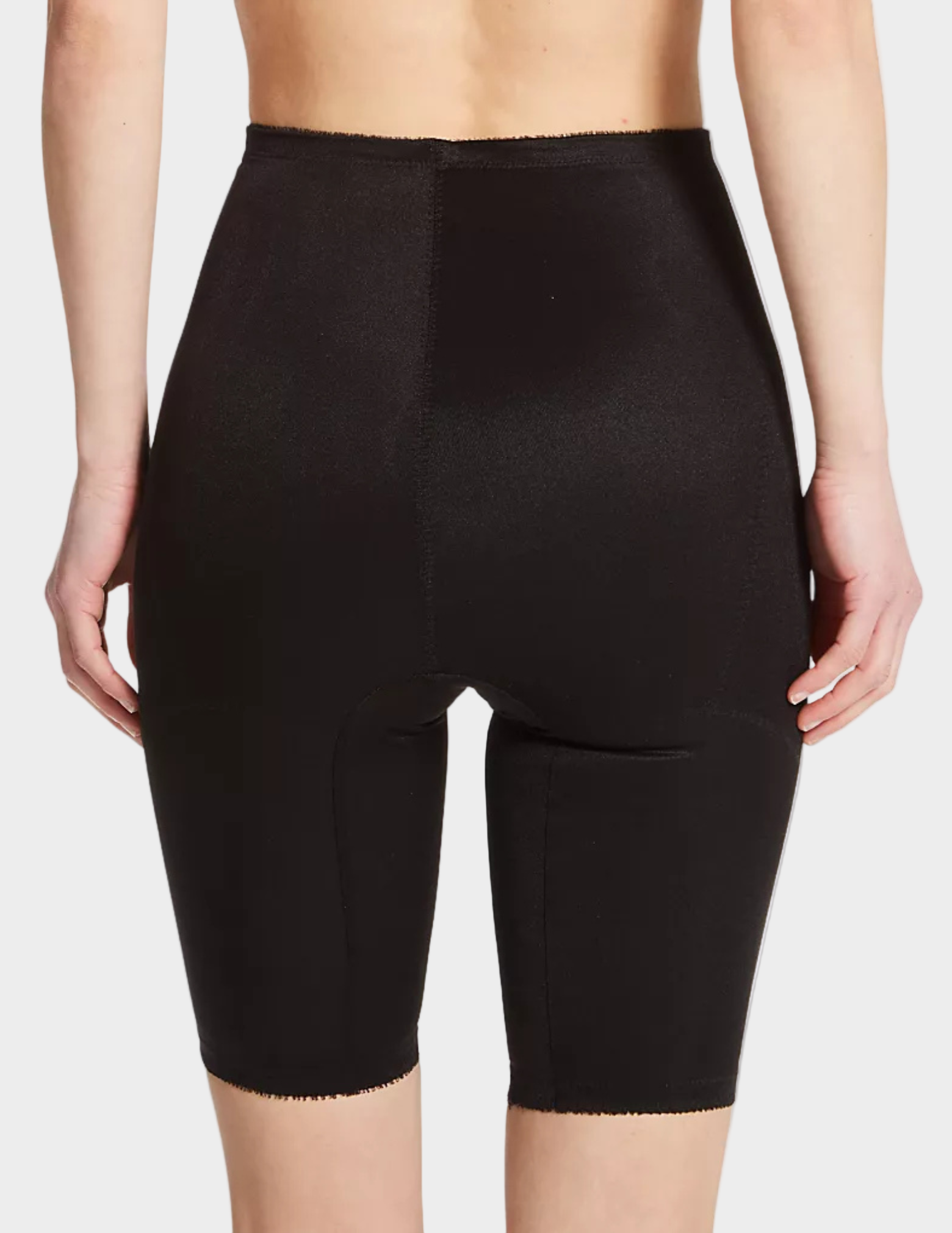 Back view of a model wearing Rago 6205 black shaping shorts