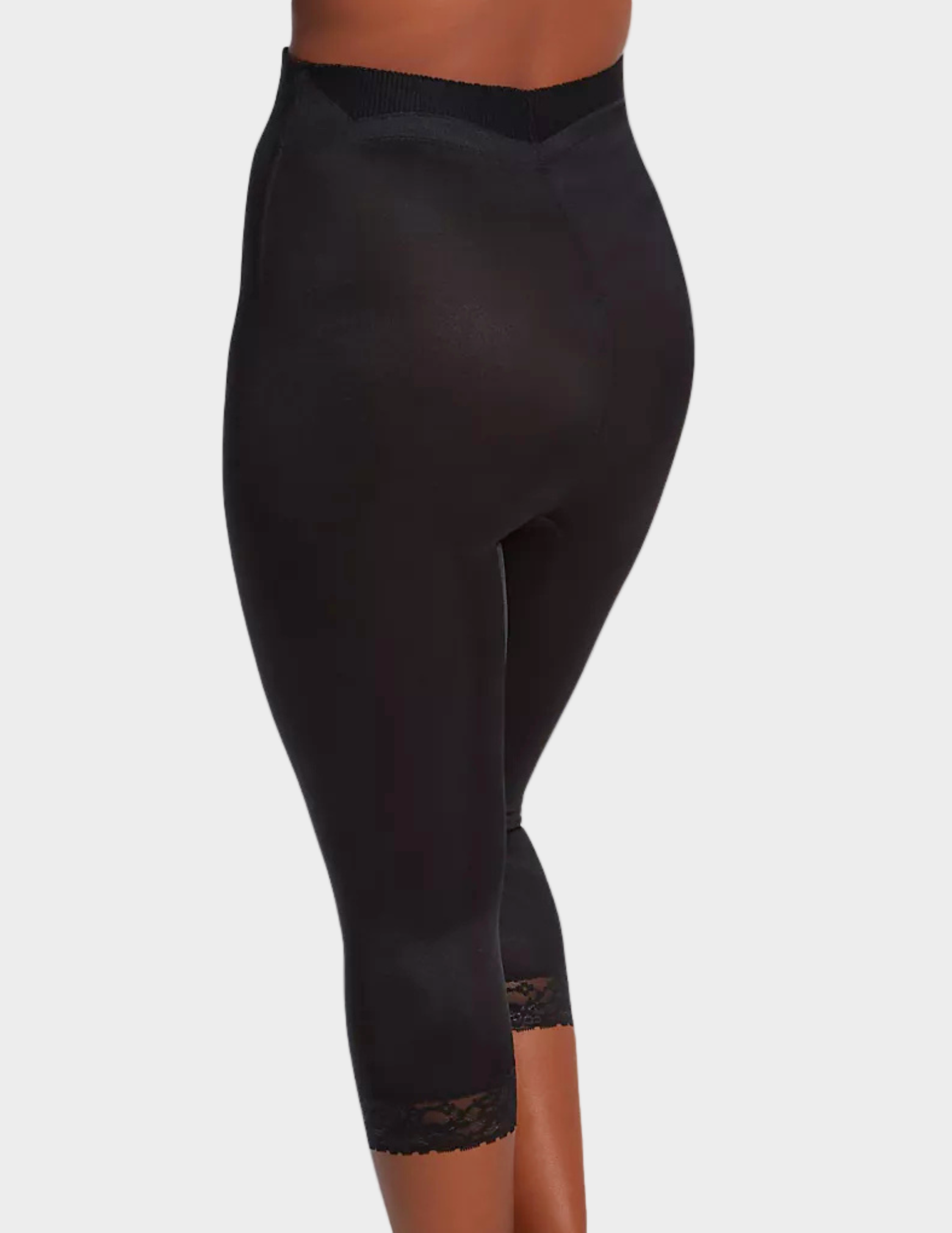 back view of a model wearing black Rago 6266 leg shaper