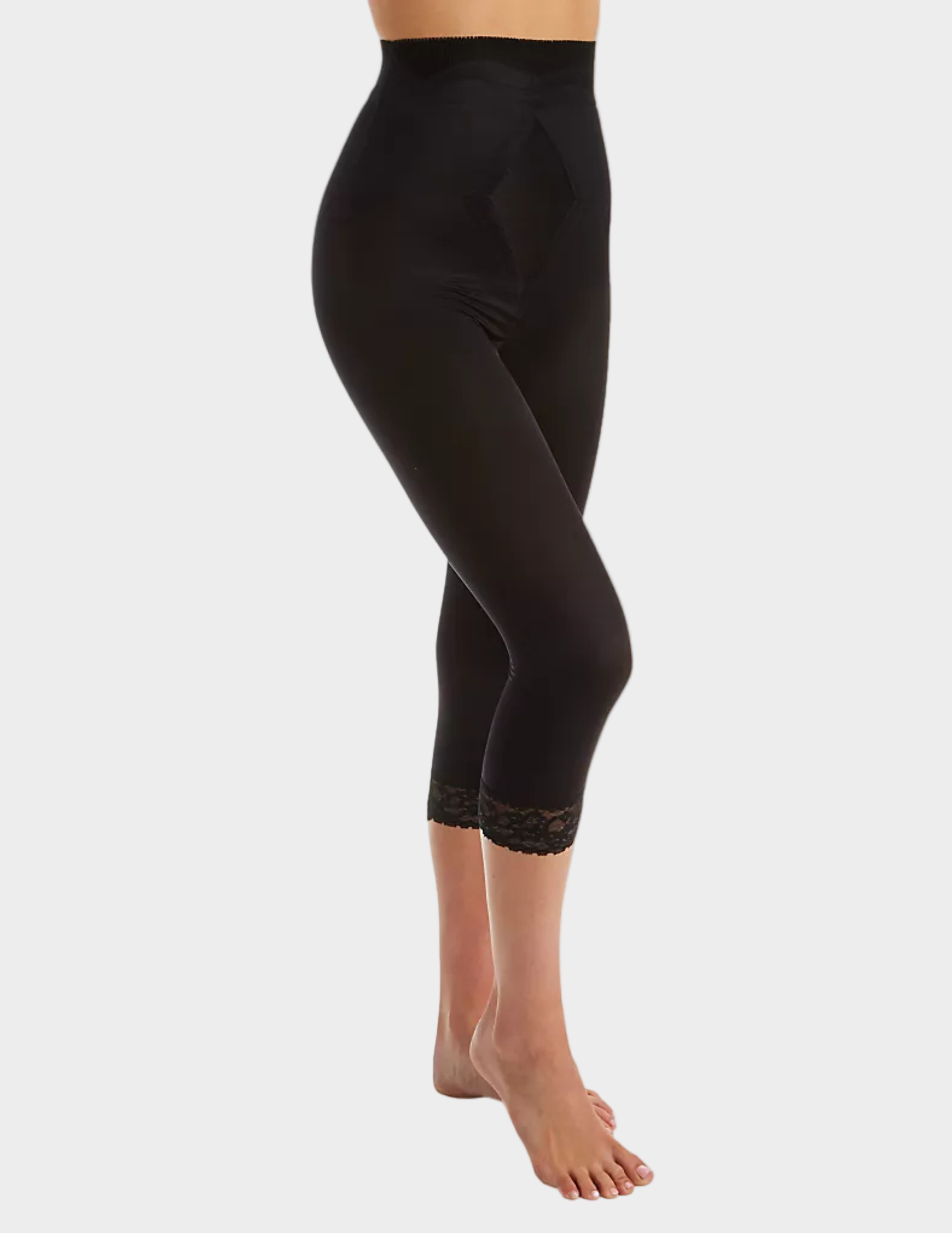 side view of a model wearing black Rago 6266 leg shaper