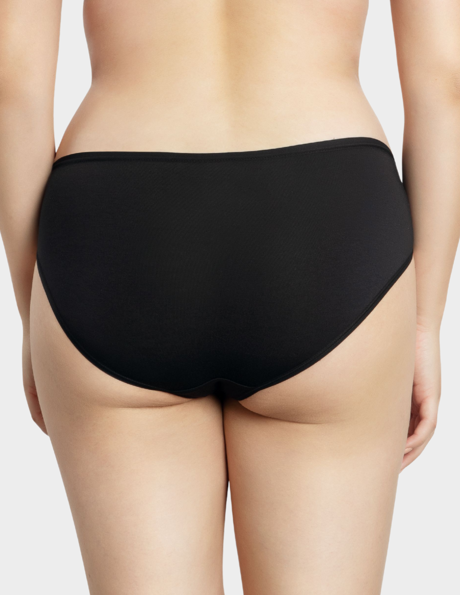 Back view of a model wearing Parfait Cozy hipster panty in Black