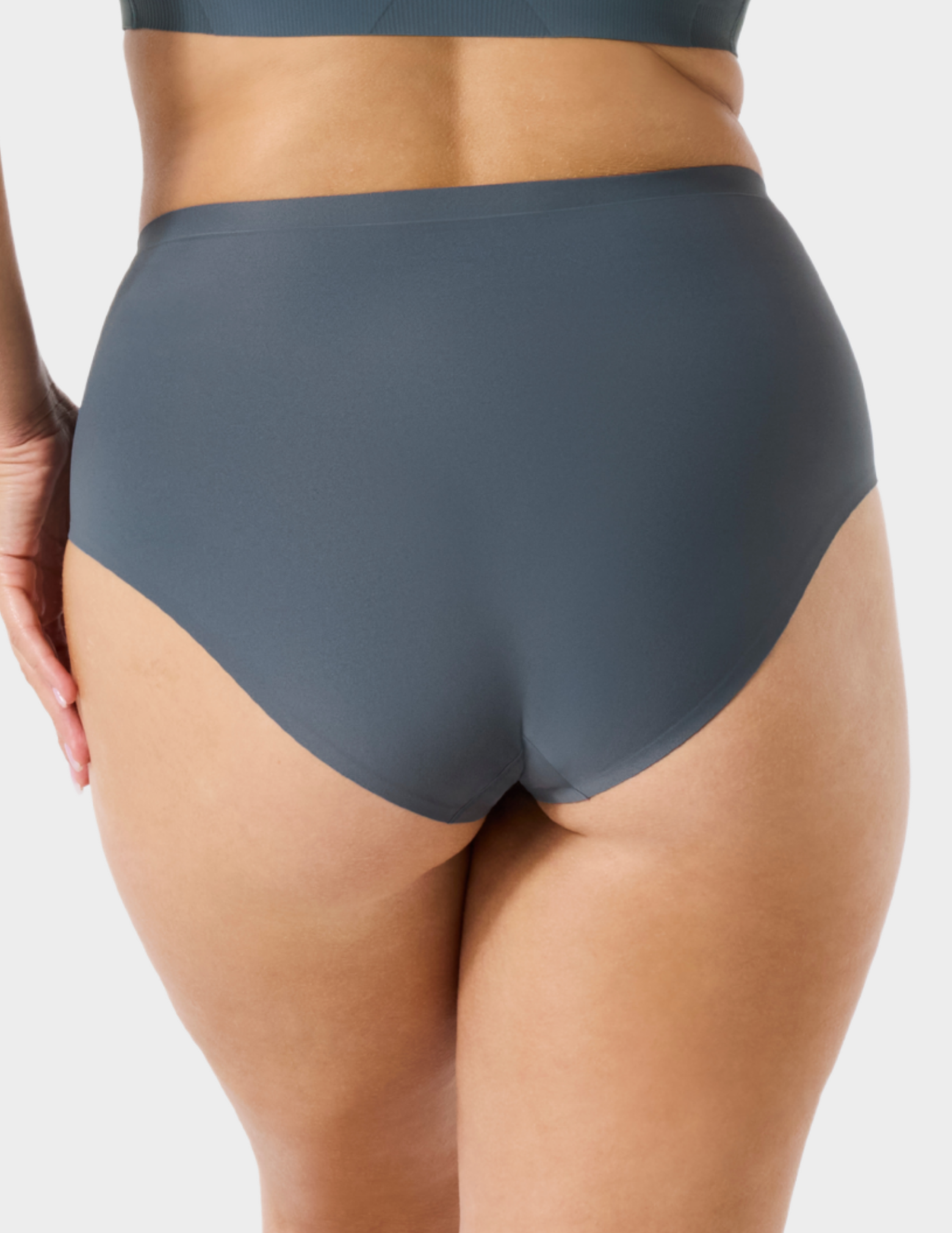 Back view of a model wearing Evelyn & Bobbie high waist brief in Slate Grey