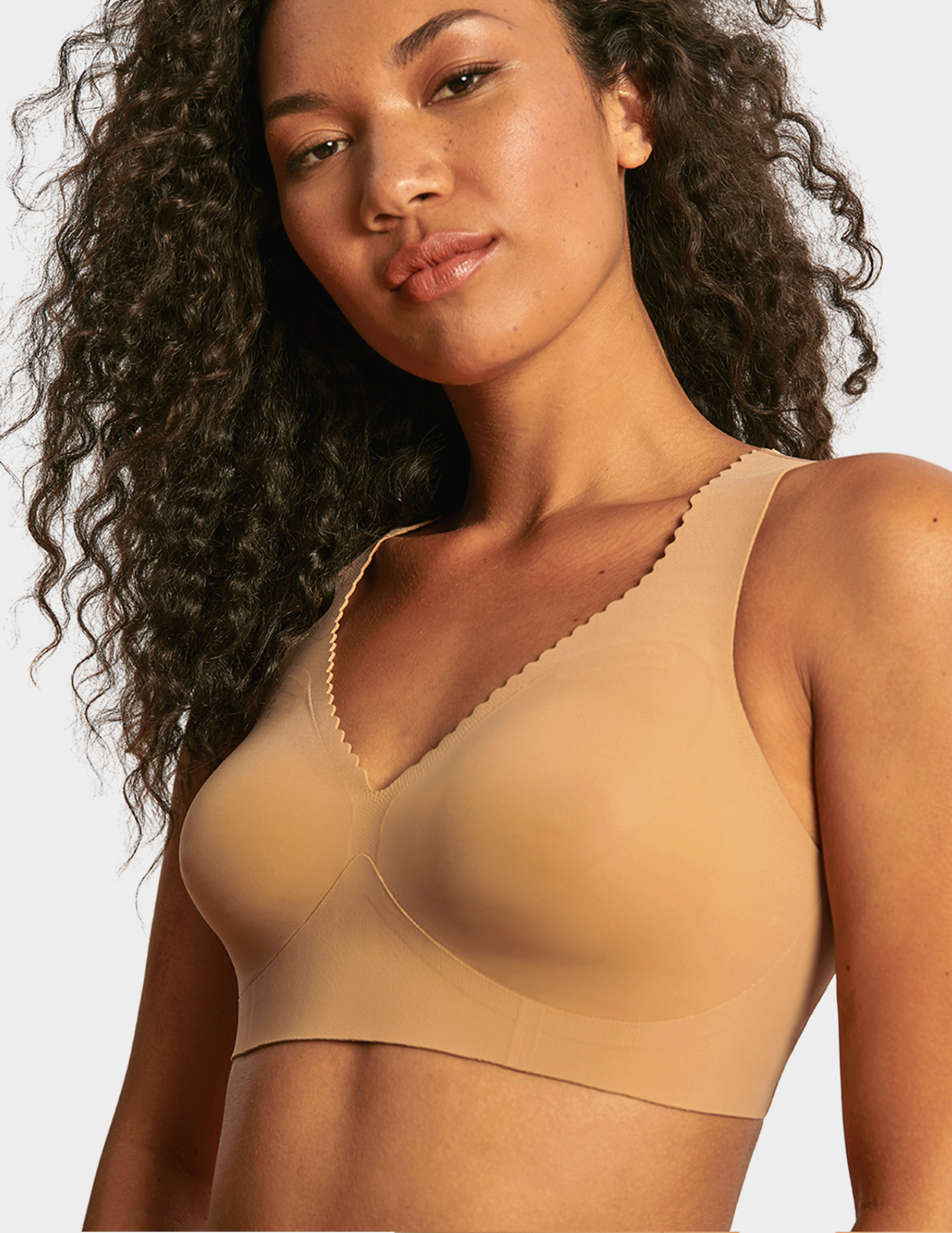 Close up front view of a model wearing Evelyn & Bobbie Evelyn Bra in Mica