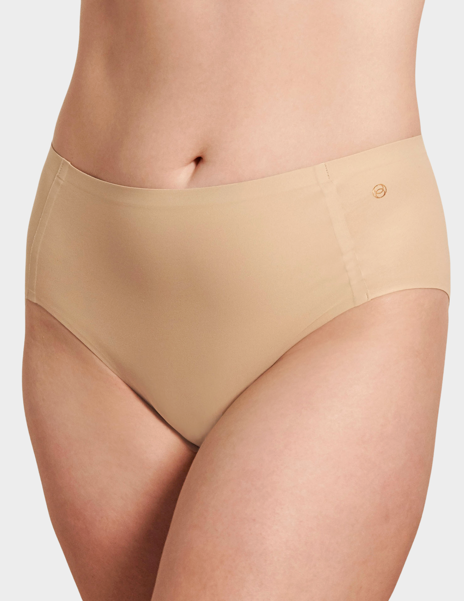 Front view of a model wearing Evelyn & Bobbie high waist brief in Sand