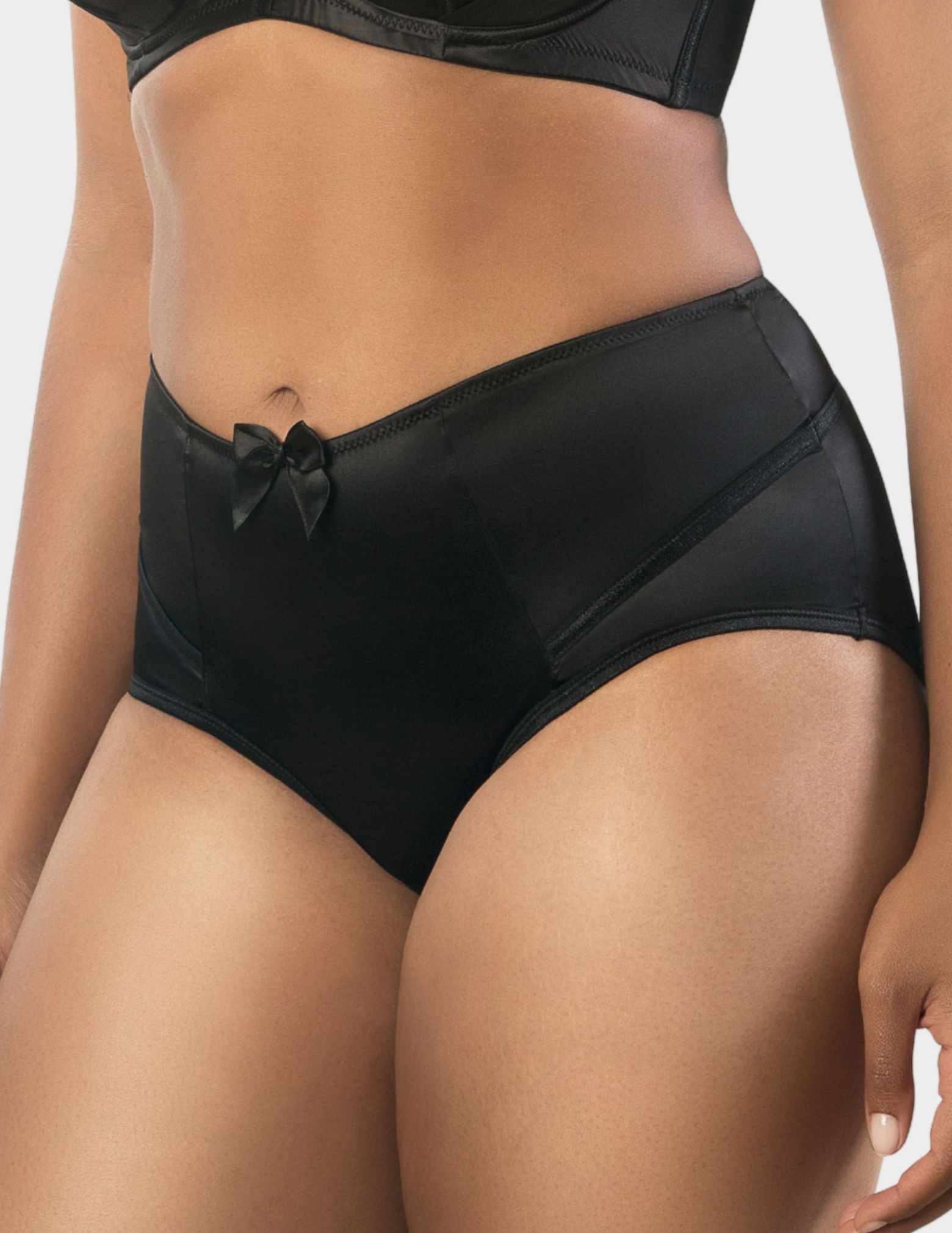 Side view of a model wearing Parfait Charlotte brief in Black