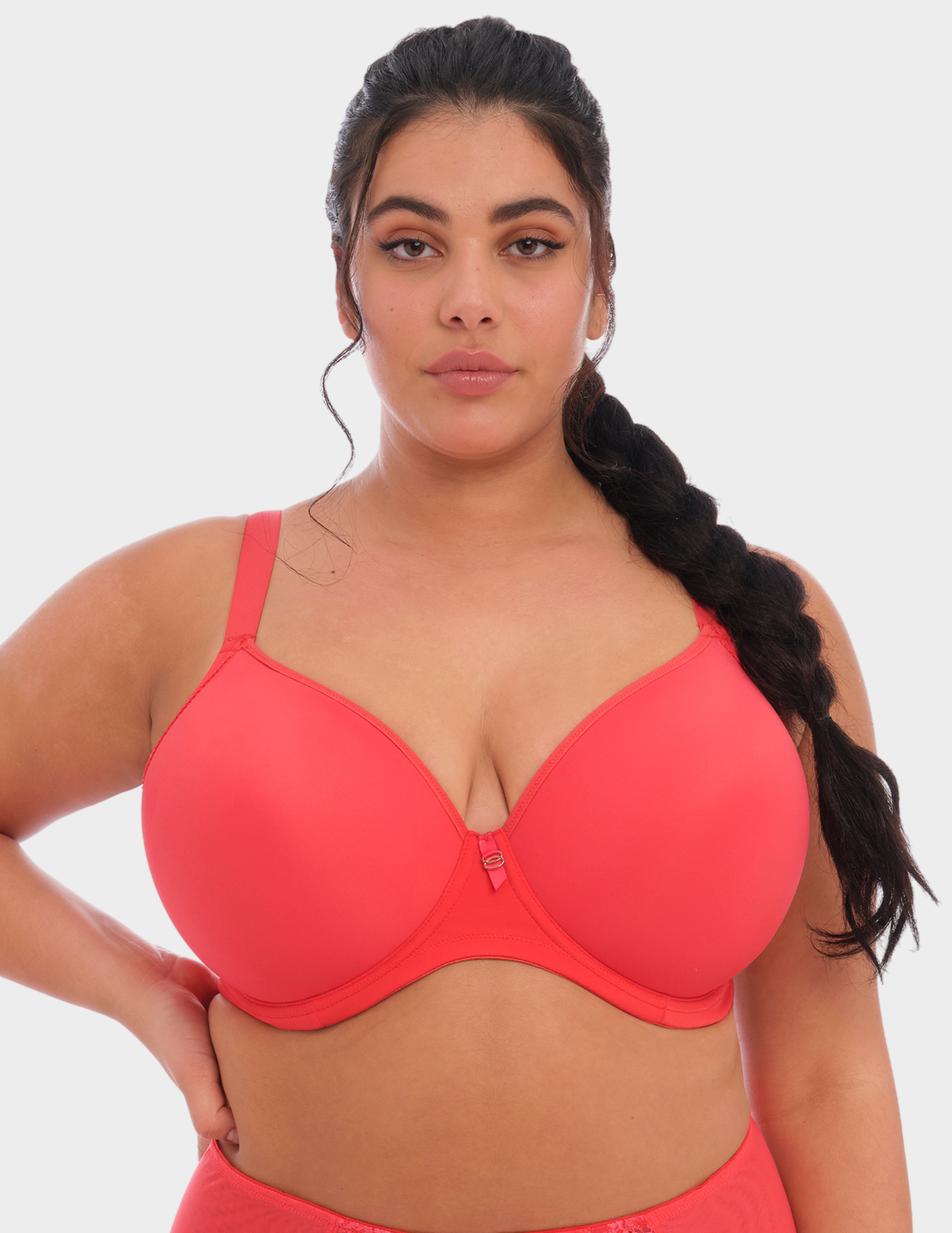 Front view of a model wearing Elomi Bijou plunge bra in cayenne