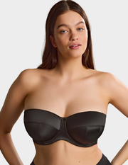 Front view of a model wearing Sculptresse Dana strapless bra in Black