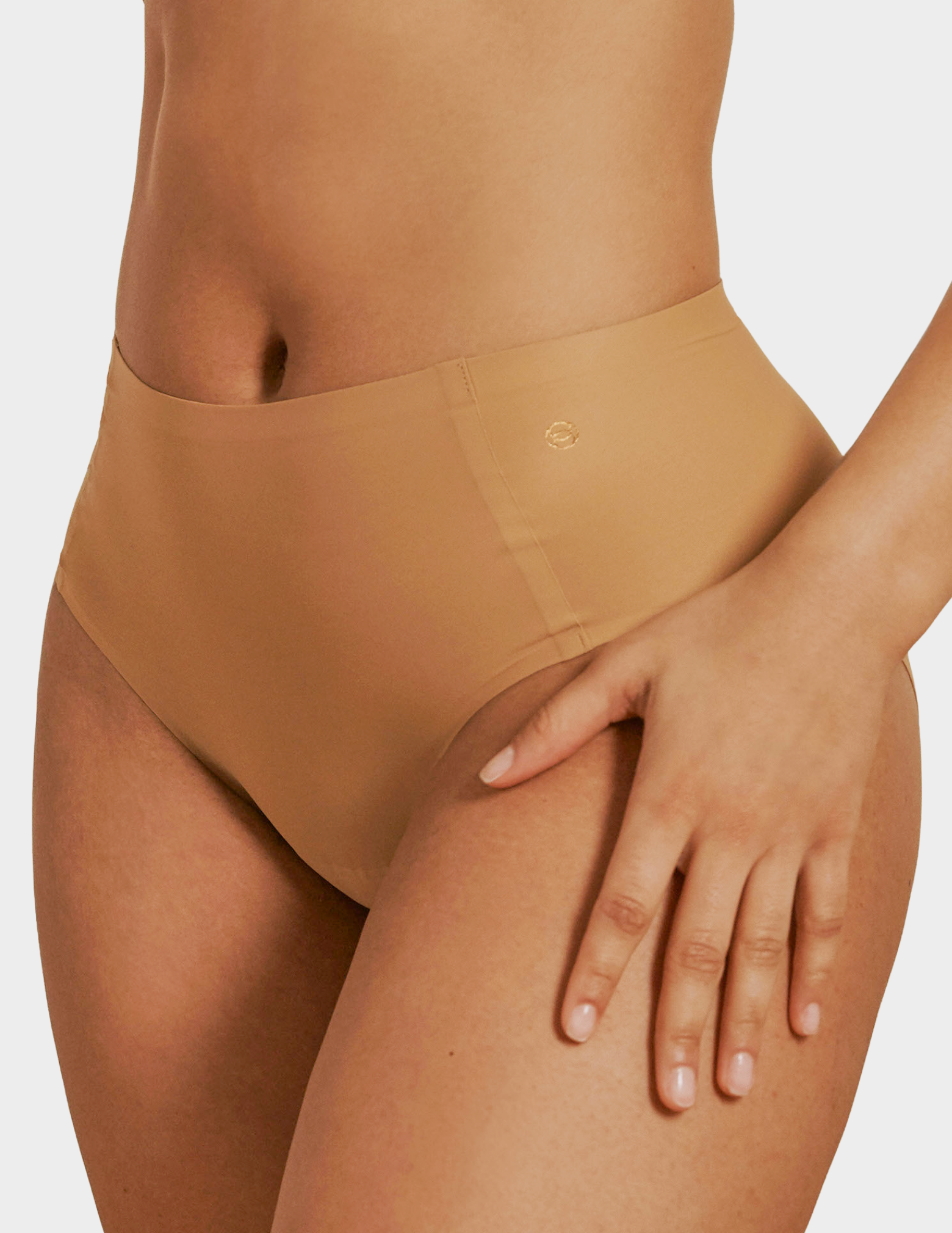 Side view of a model wearing Evelyn & Bobbie high waist brief in Mica