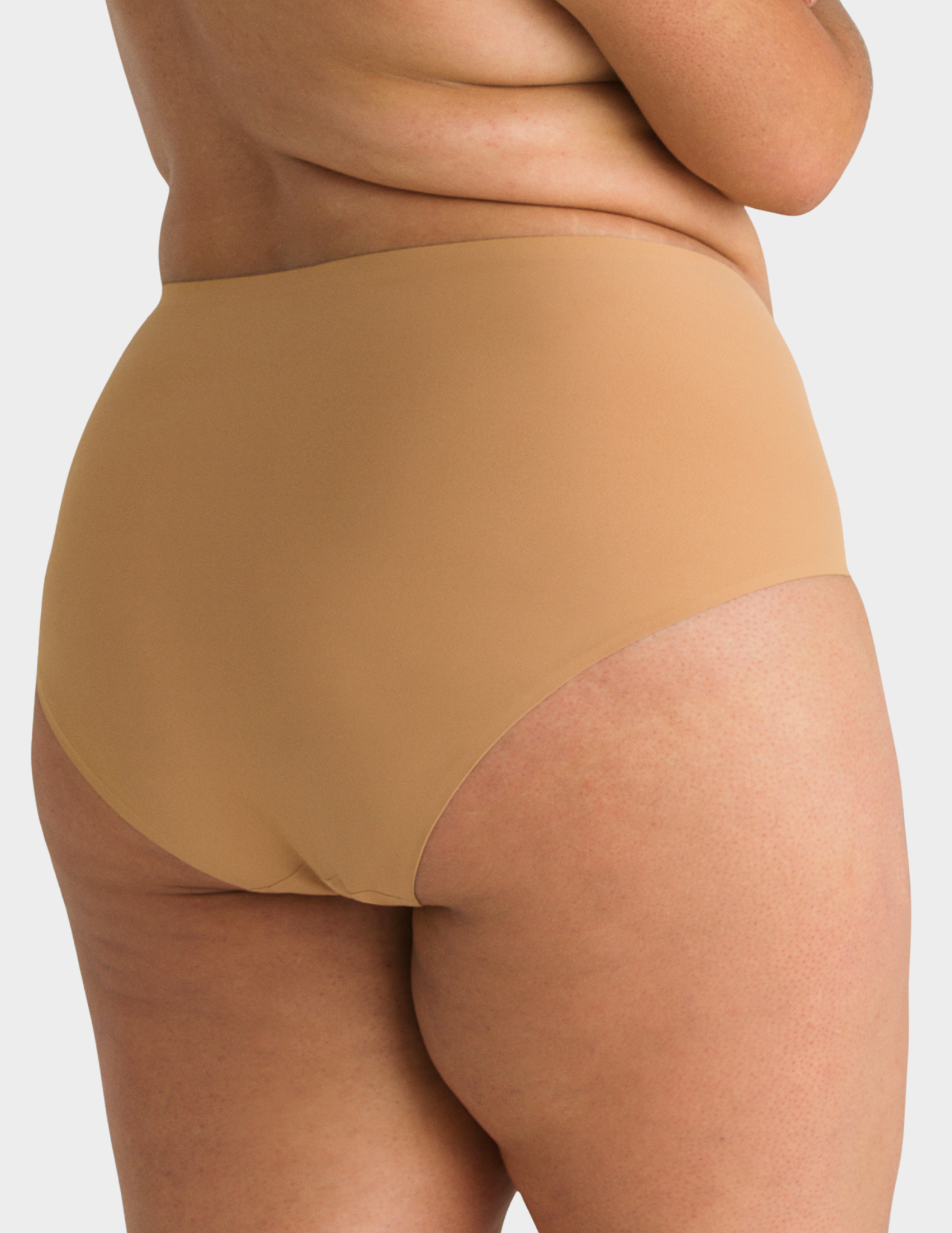 Back view of a model wearing Evelyn & Bobbie high waist brief in Mica