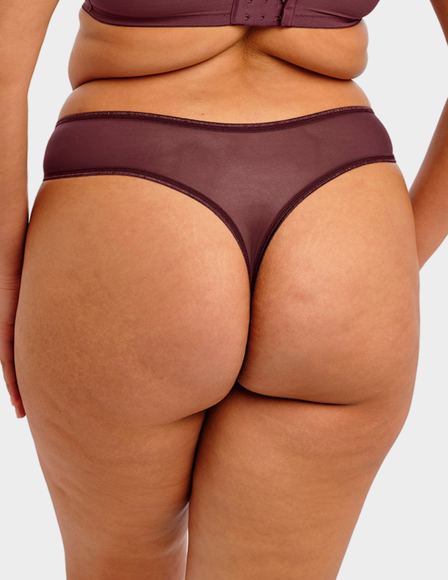 Back view of a model wearing Elomi Matilda thong in sugarplum