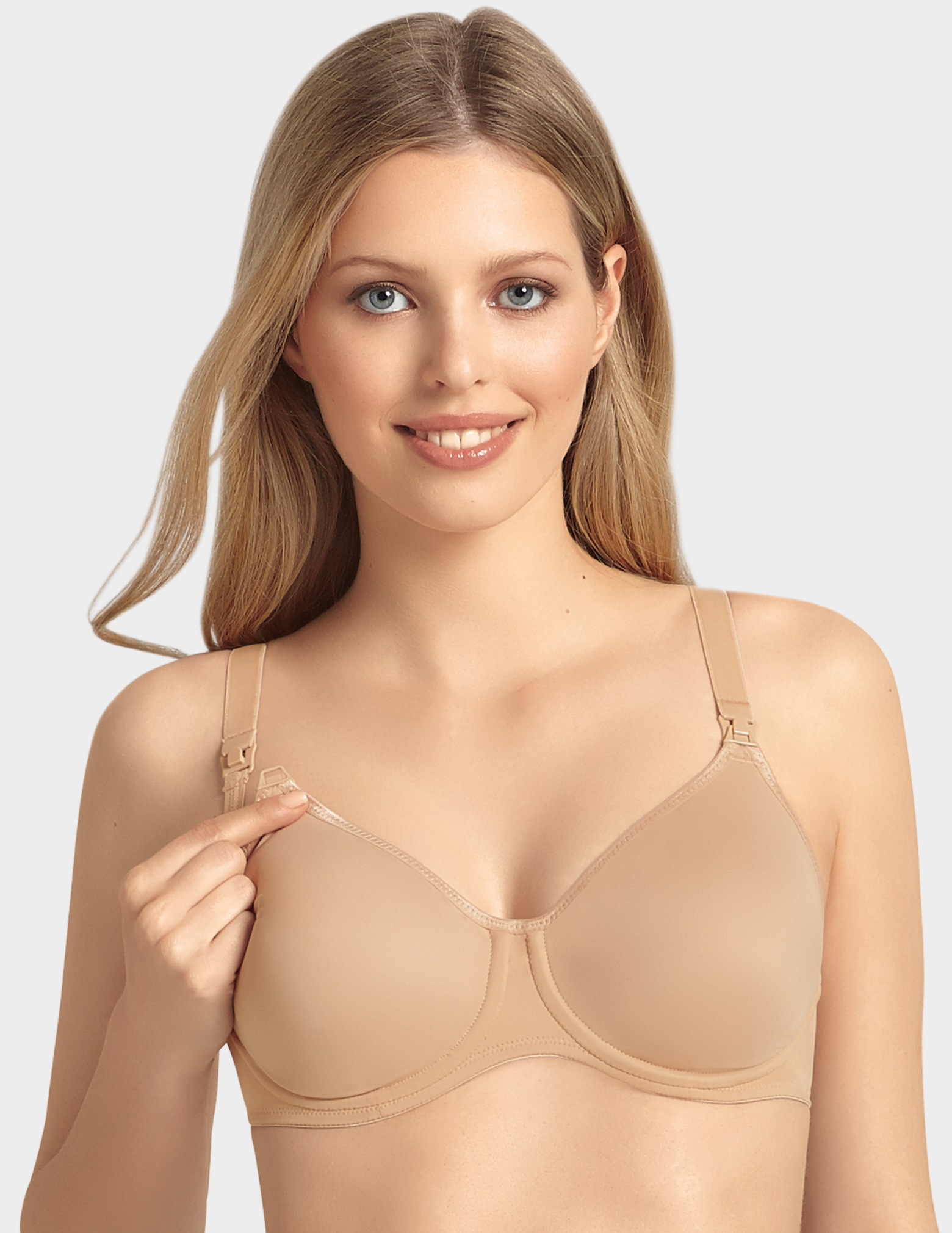 Front view of a model wearing an Anita Seamless nursing bra in color Deep Sand