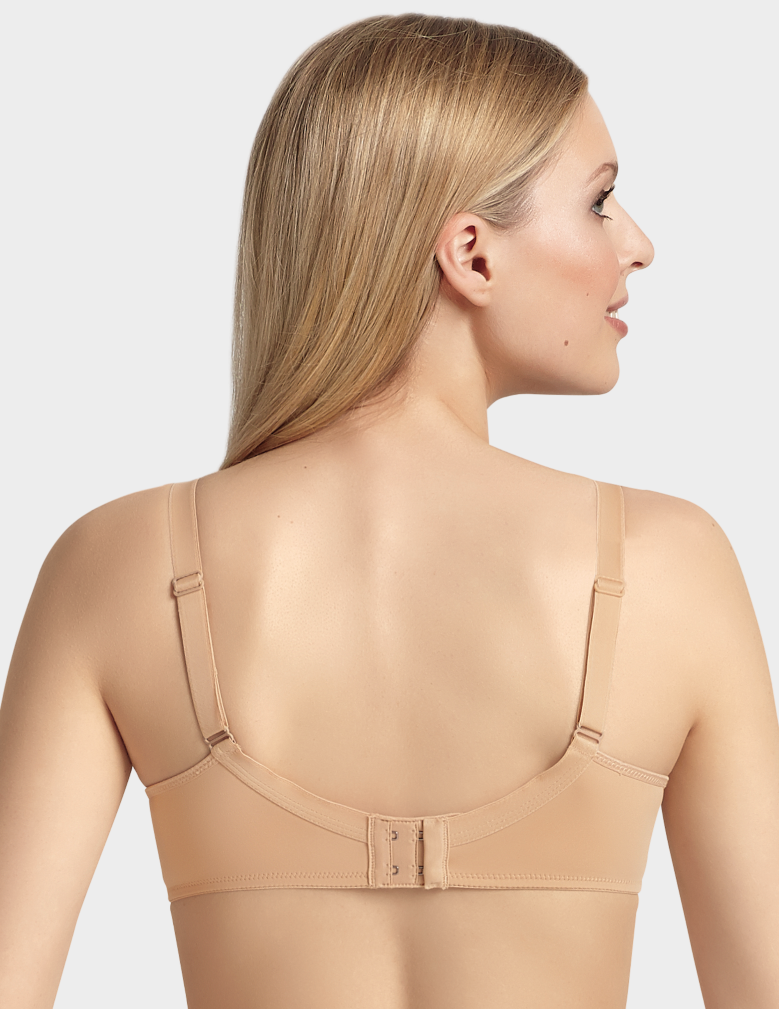 Back view of a model wearing an Anita Seamless nursing bra in color Deep Sand