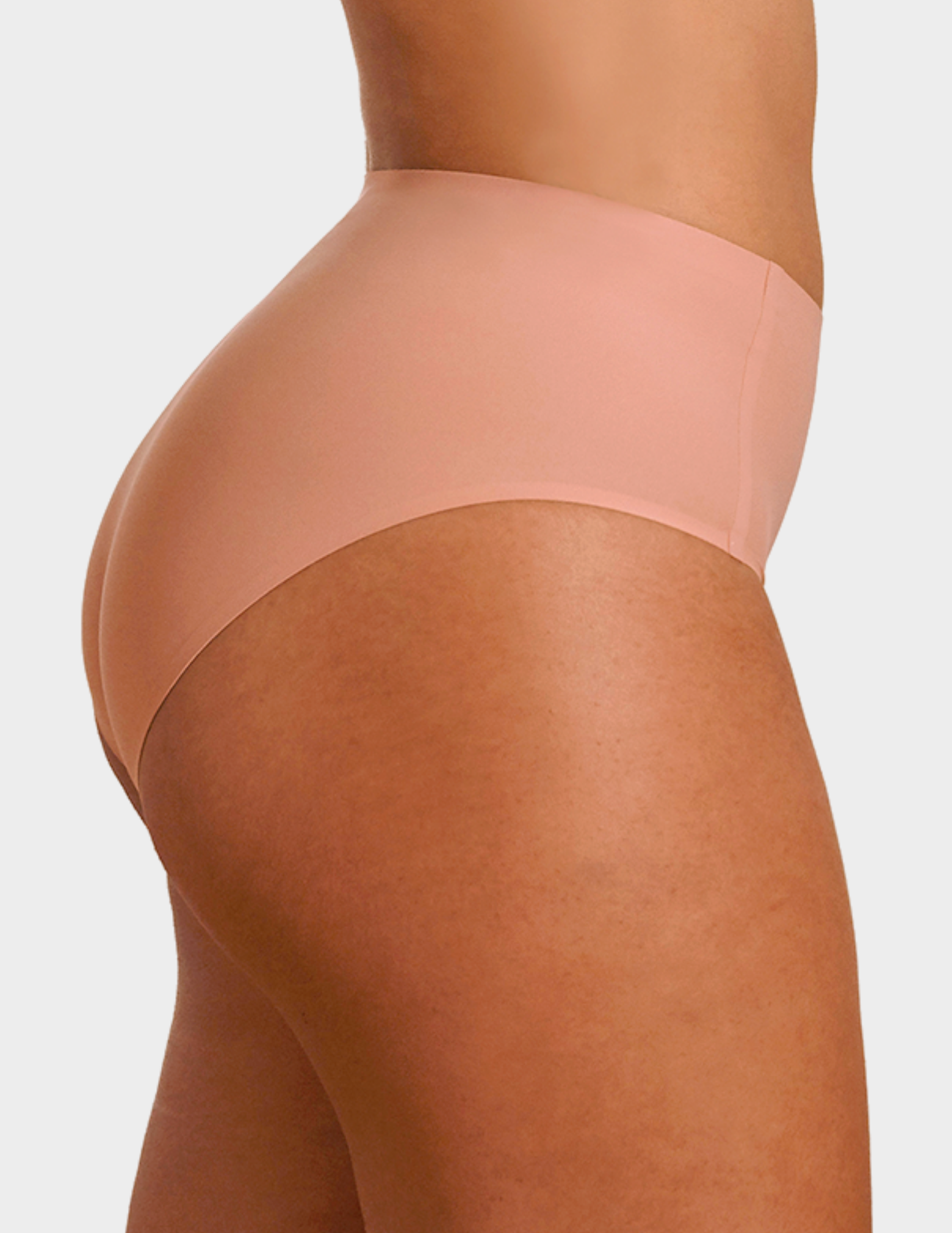 Side view of a model wearing Evelyn & Bobbie high waist brief in Himalayan Salt