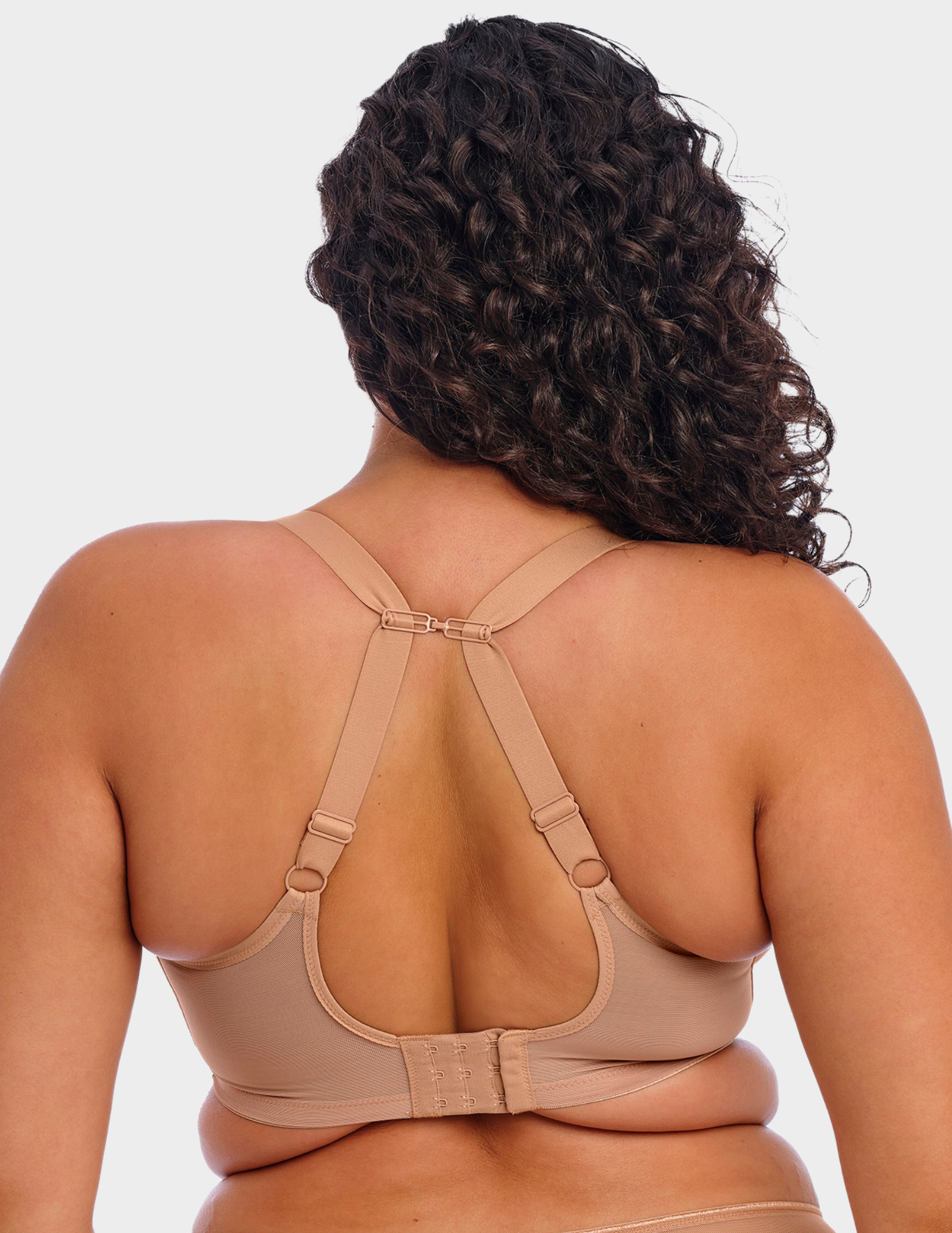 Back view of a model wearing Elomi Matilda plunge bra in café au lait with straps hooked
