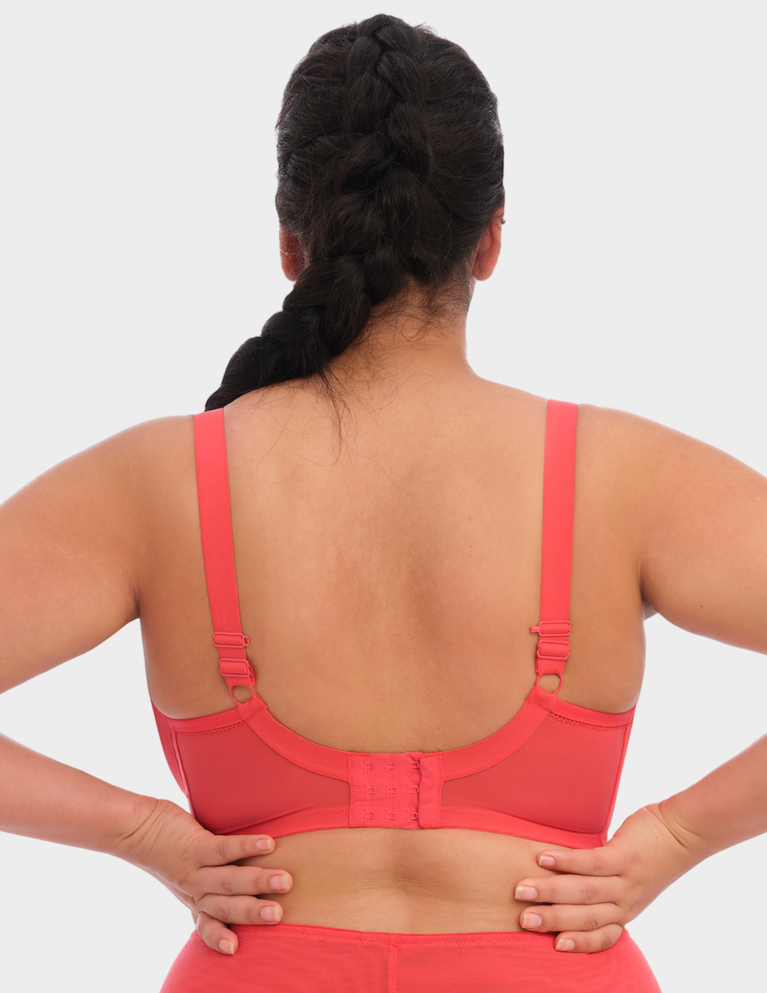 Back view of a model wearing Elomi Bijou plunge bra in cayenne