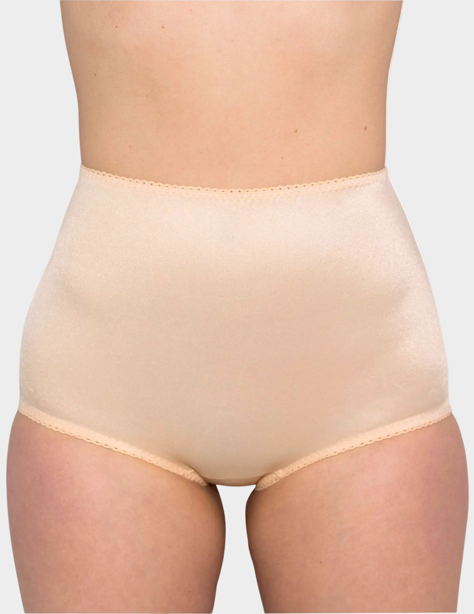 Front view of model wearing Rago 910 Beige smoothing panty