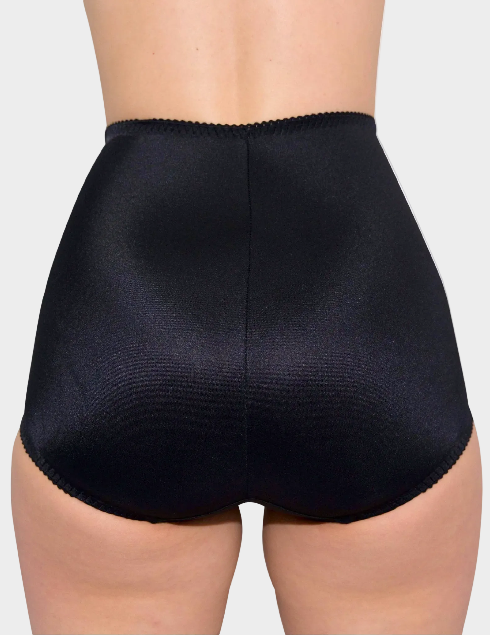 Back view of model wearing Rago 910 smoothing panty in black