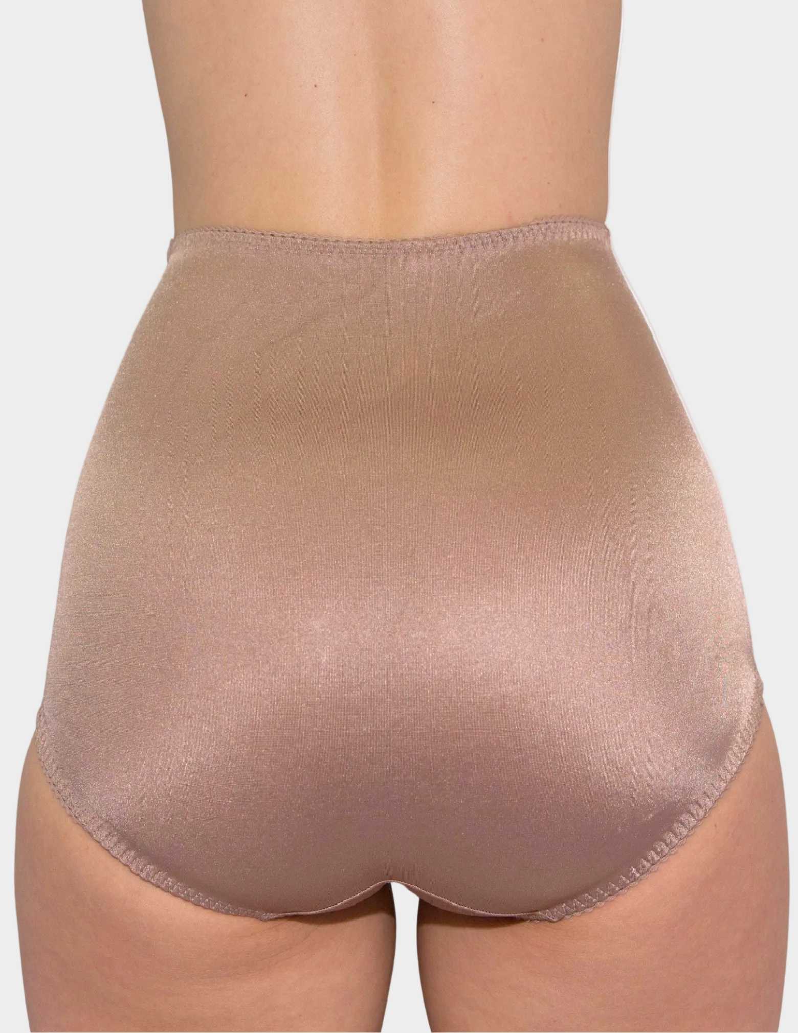 Back view of model wearing Rago 910 smoothing panty in mocha