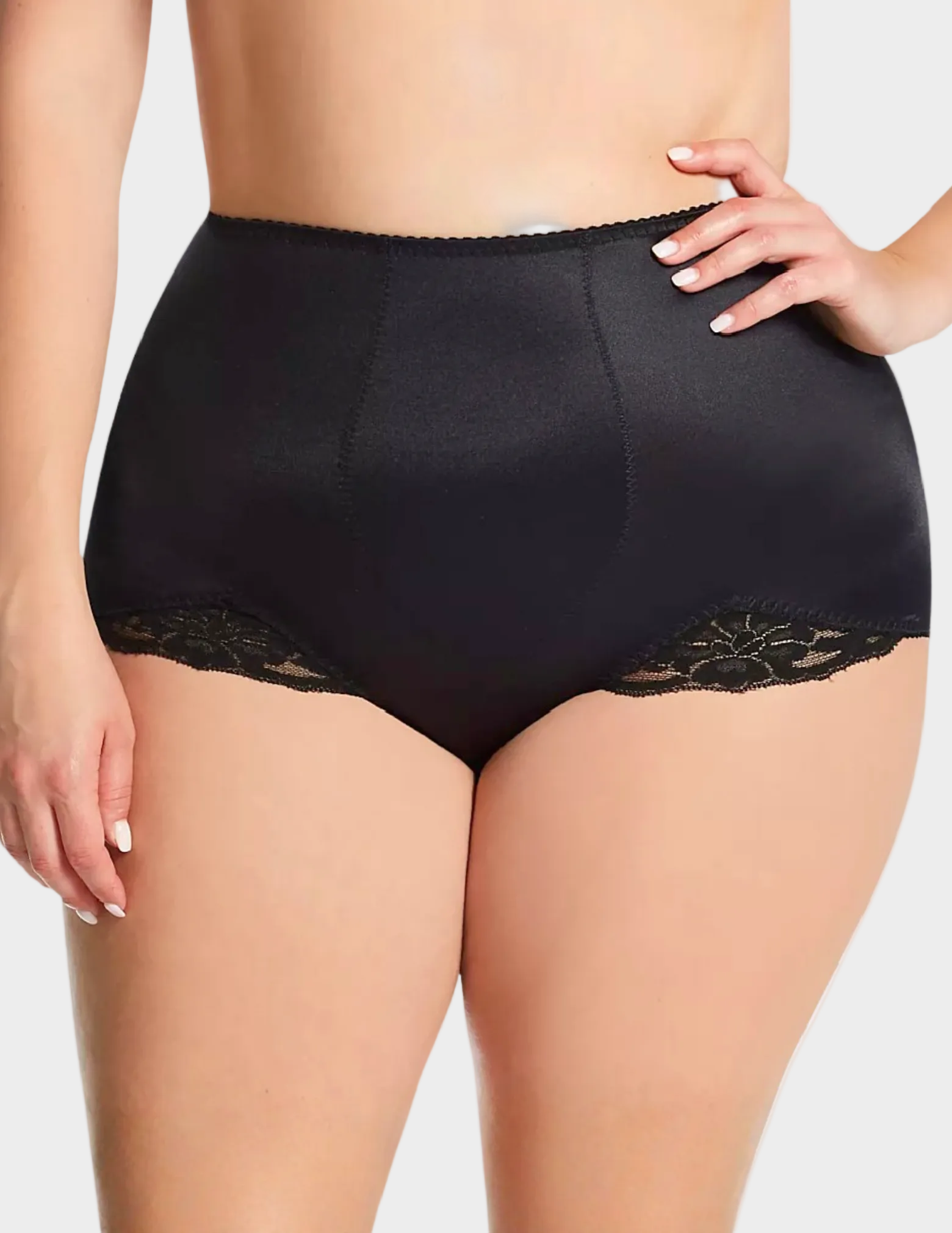 Front view of a curvy model wearing Rago 919 black shaping panty